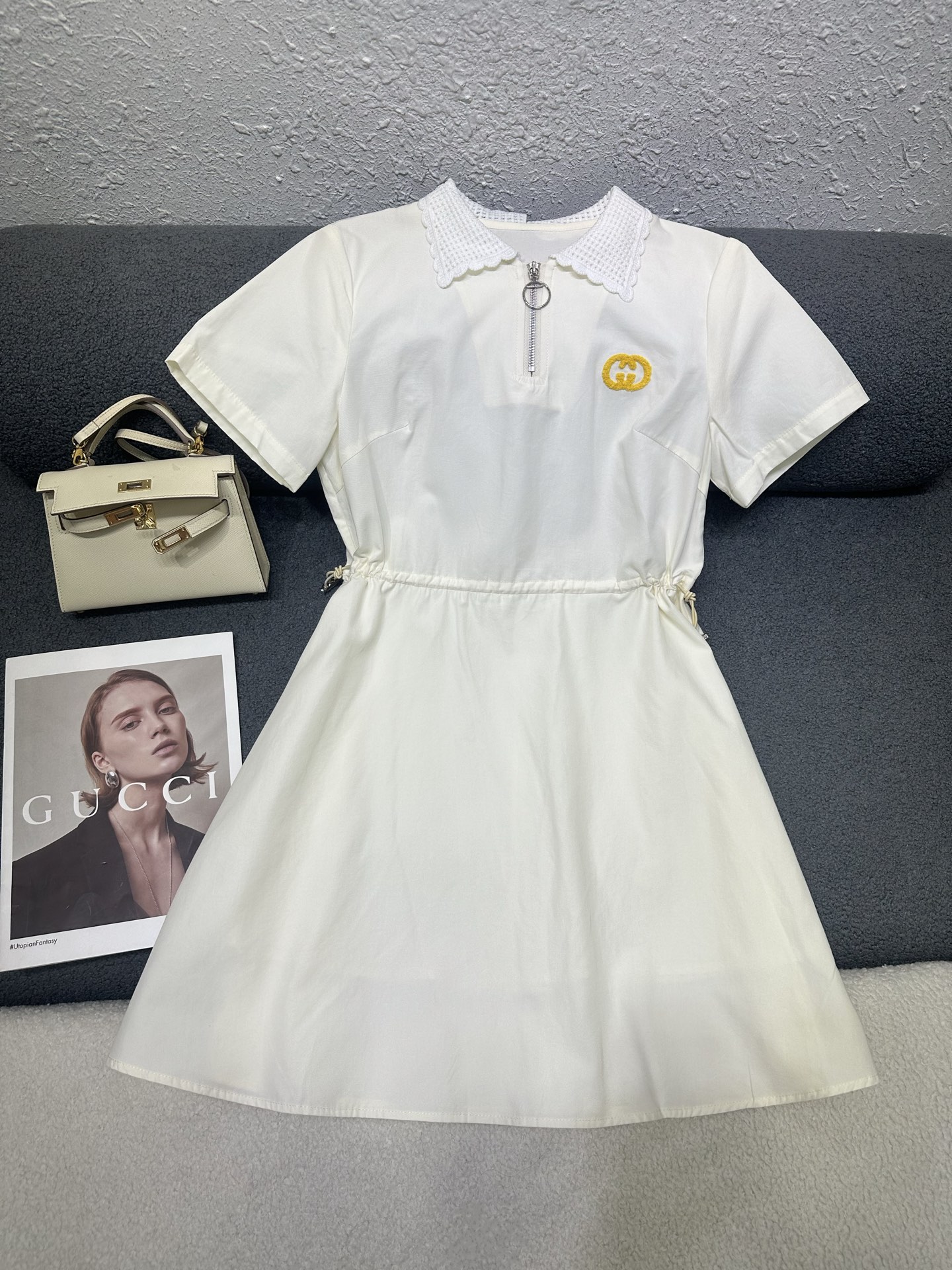 NO:873184,Gucci*2026 new summer style lapel short-sleeved dress. Double G raw edge embroidery decoration on the chest. Hollow knitting design on the collar to add layering. Adjustable elasticity on the waist with a drawstring design. The style is youthful and modern. Monochrome SML,,gucci,skirts,T-shirt,19860909Gucci*2026夏季新款翻领短袖连衣裙 胸前双G毛边绣装饰点缀 领子做镂空编织设计增加层次感 腰部做抽绳设计可调节松紧 版型减龄洋气 单色SML,,gucci,skirts,T-shirt,,Women's clothing