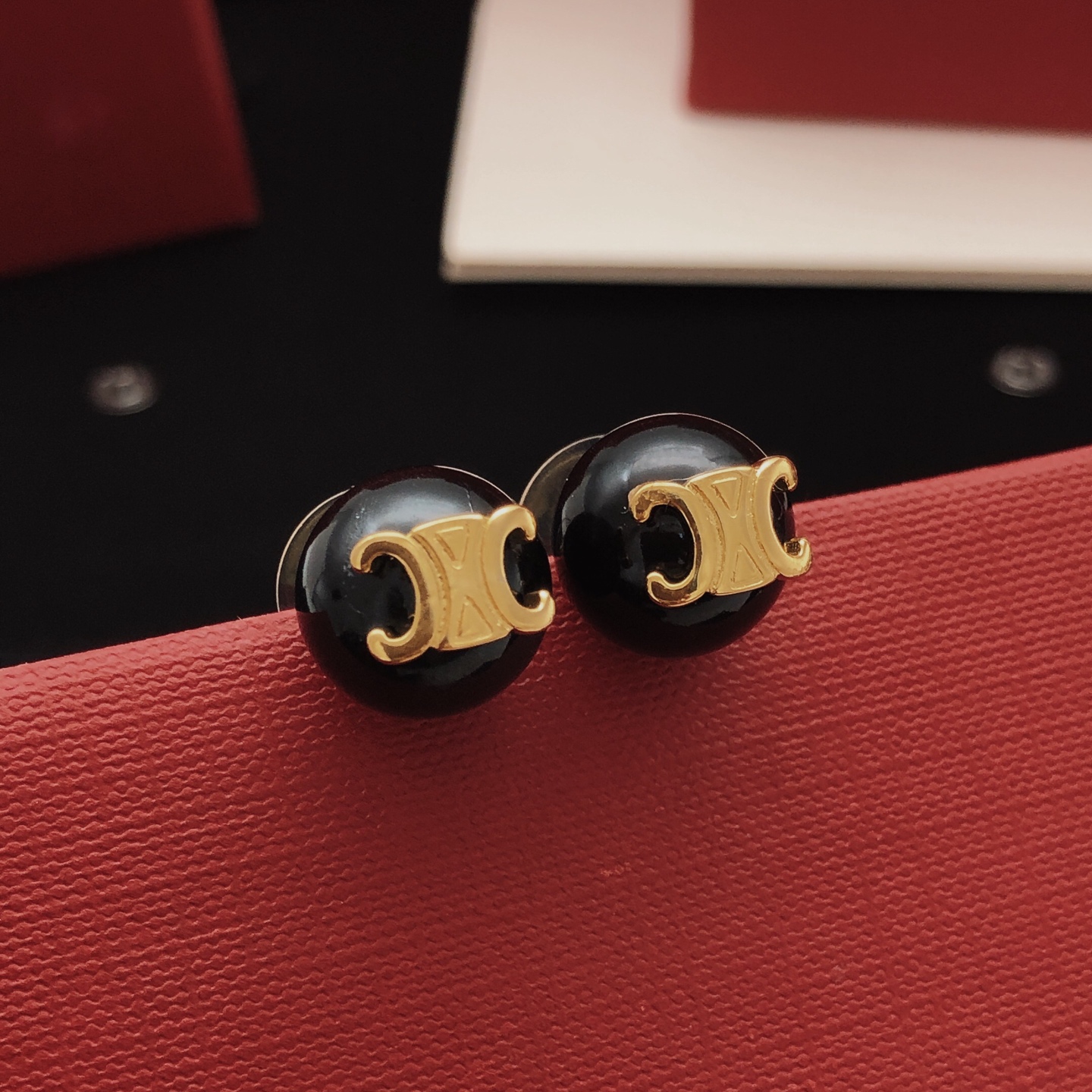 Celine Triomphe earrings gold-tone metal with black resin beads 10mm bead diameter