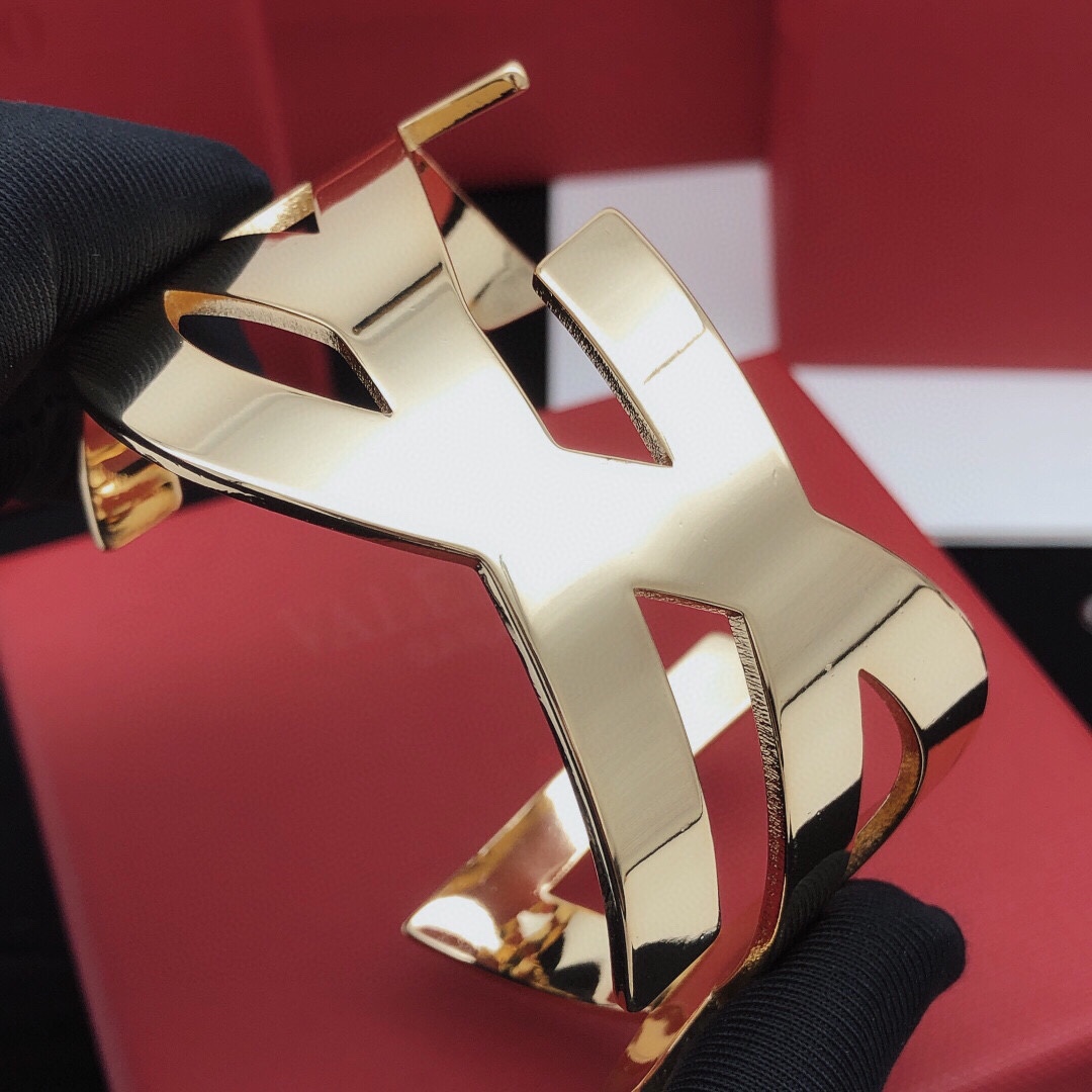 Valentino VLogo Signature Cuff bracelet Polished gold-tone metal no accent stones One Size open cuff standard 6 5 inch inner circumference