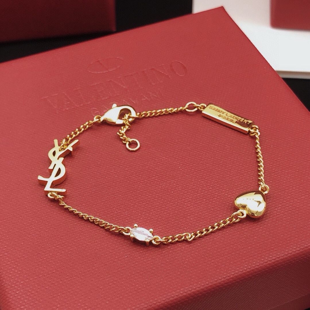 Saint Laurent Cassandre Heart Crystal Charm Bracelet bracelet gold-tone metal with clear faceted crystal 18cm with 2cm extender