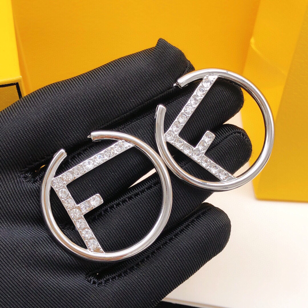 N.º FDED0028 Pendientes Fendi redondos con F plateado y diamantes