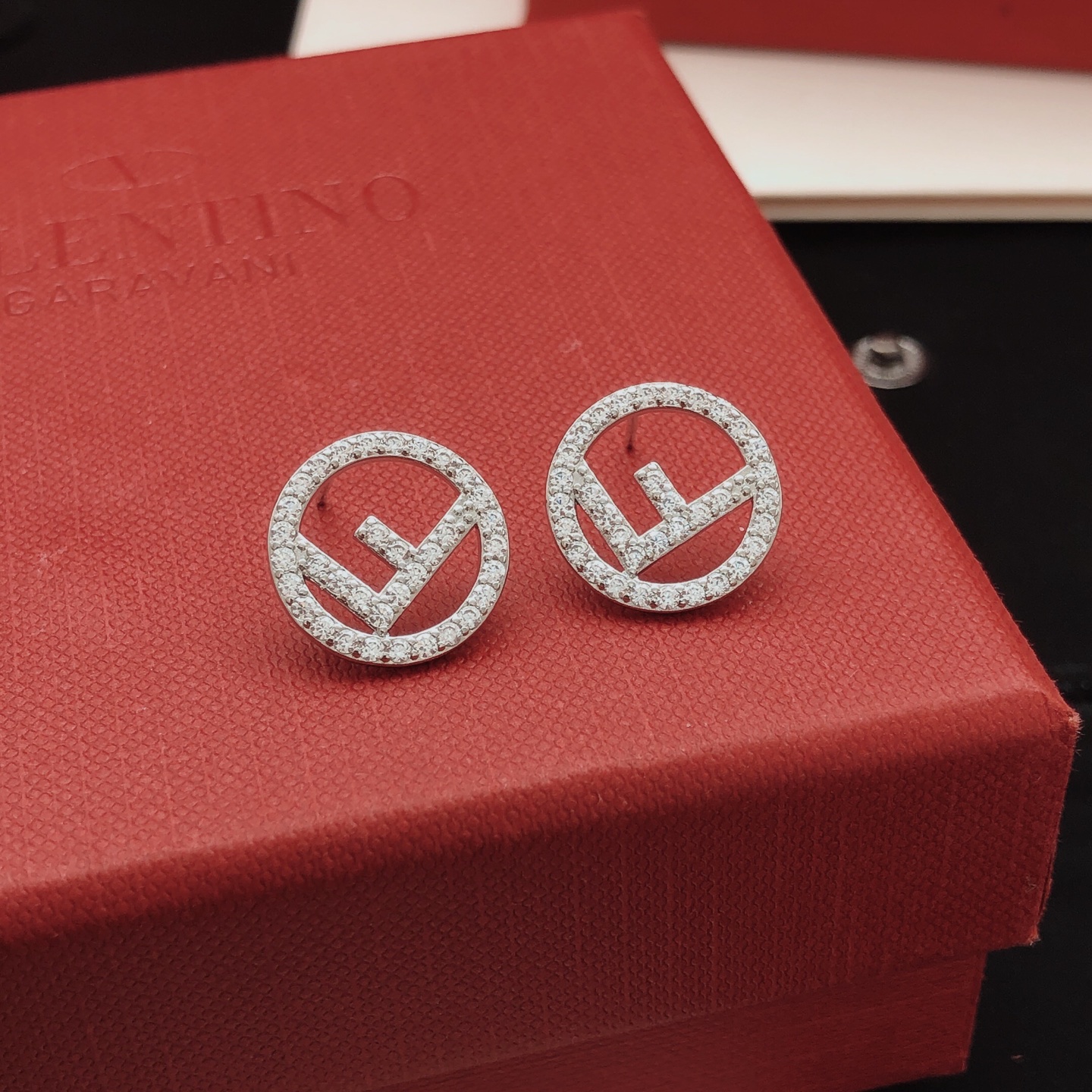 Fendi F is Fendi earrings silver-toned metal with clear pave crystals 1 2cm diameter