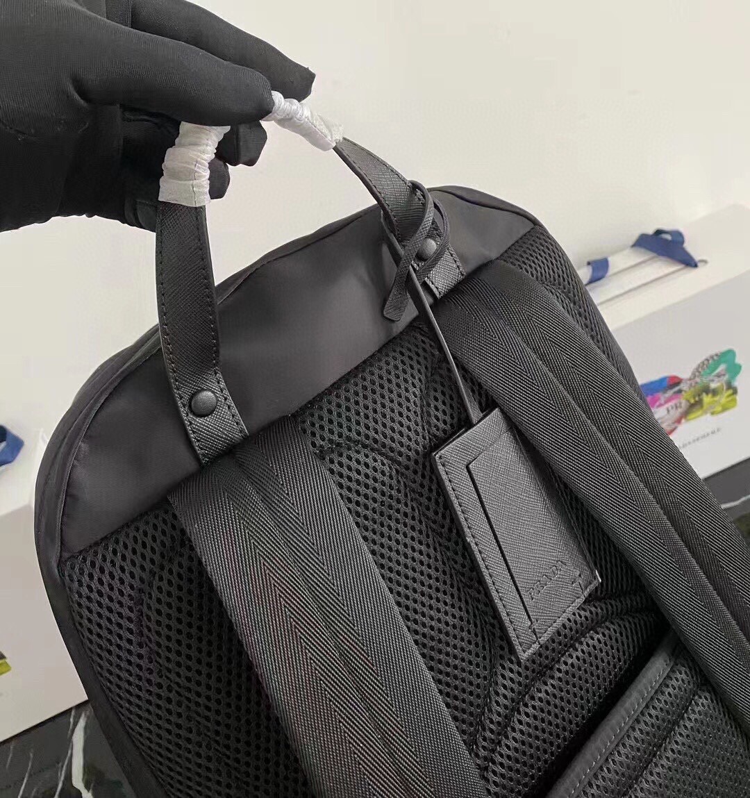 Prada Men's Black Saffiano Leather Trim Nylon Backpack - Minimalist Design 5 i1750311311 979 0