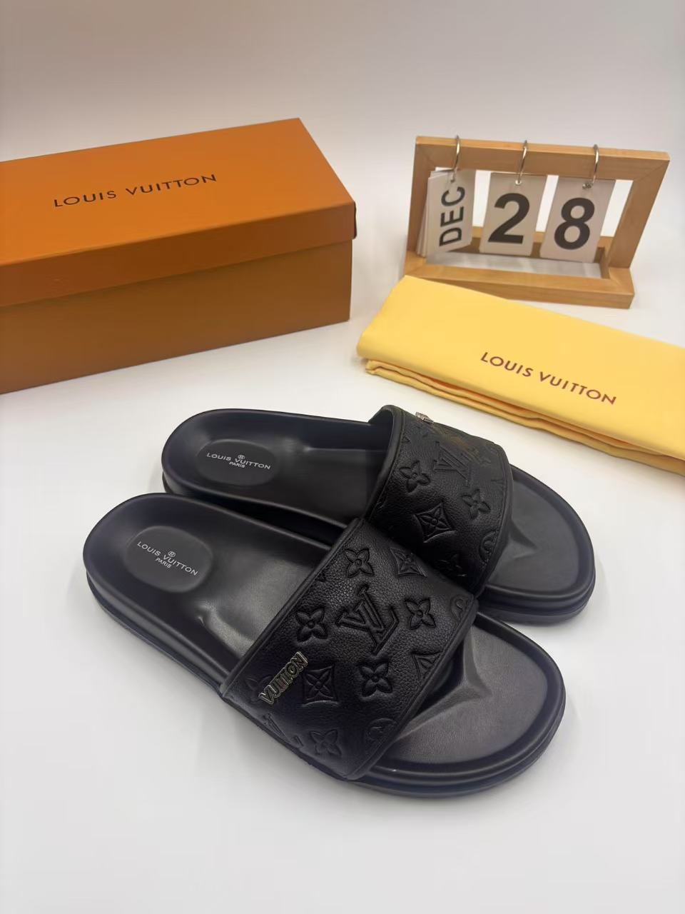 Elegant Louis Vuitton Men's Black Leather Monogram Embossed Slides 3 i1742746322881 2426 0 1