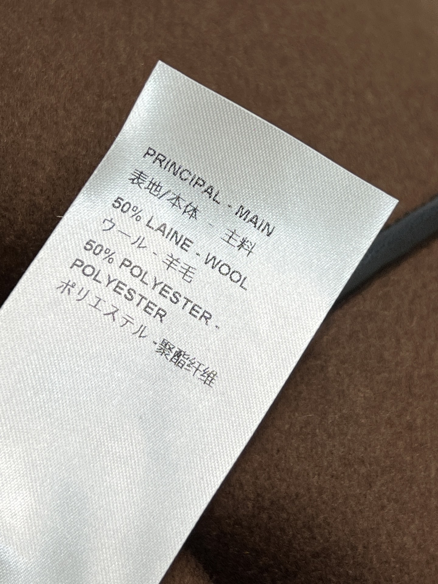 L家 26早春新款 棕色羊毛一片式系带短裙 日常通勤或休闲都很适合 一片式式A字版型修饰腿型 黑色皮绳系