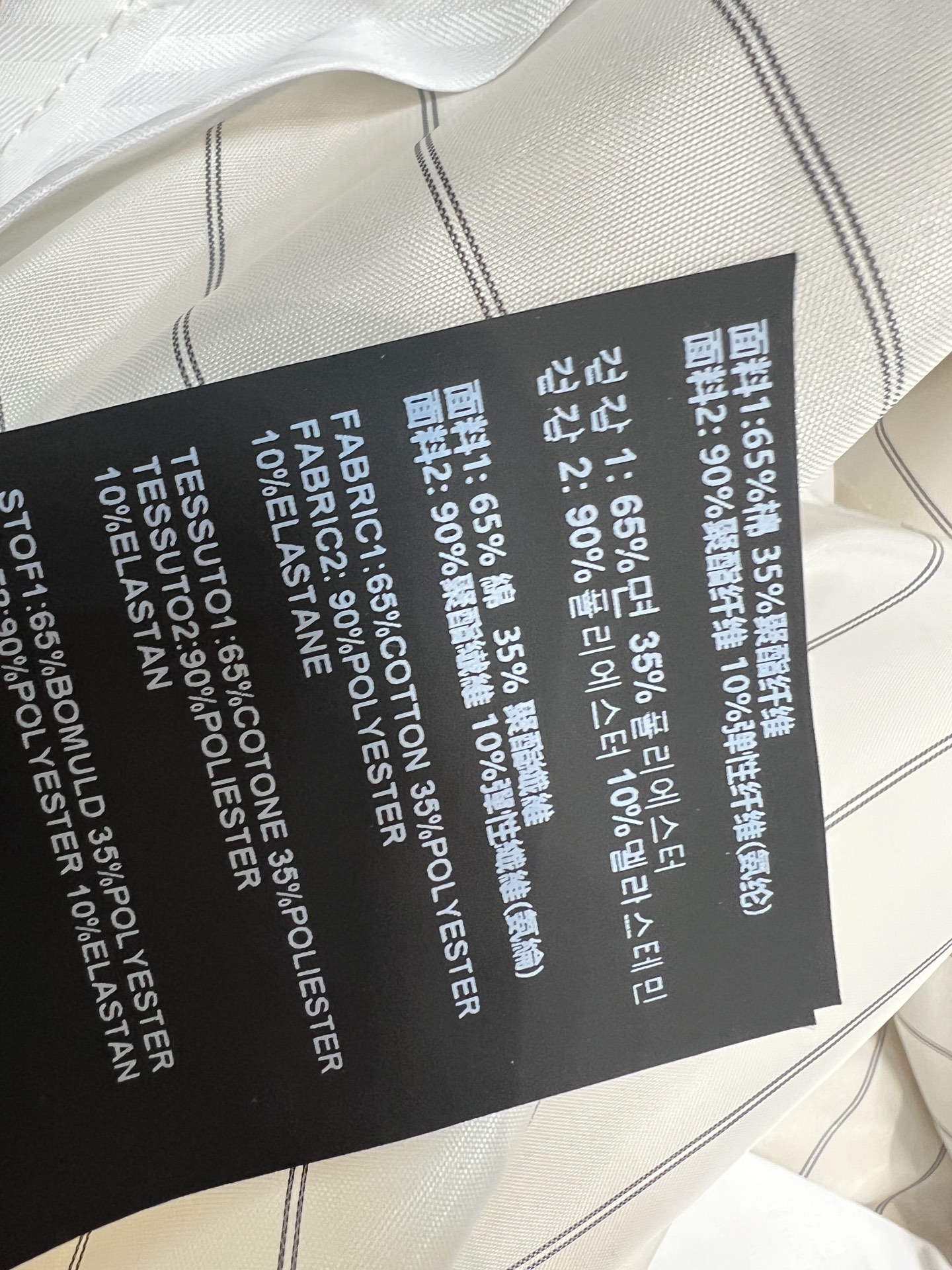 MIU家 26夏季新款 拼接麂皮短裙 棕色麂皮+米色挺括面料 毛边下摆超有随性松弛感 复古氛围拉满 正面