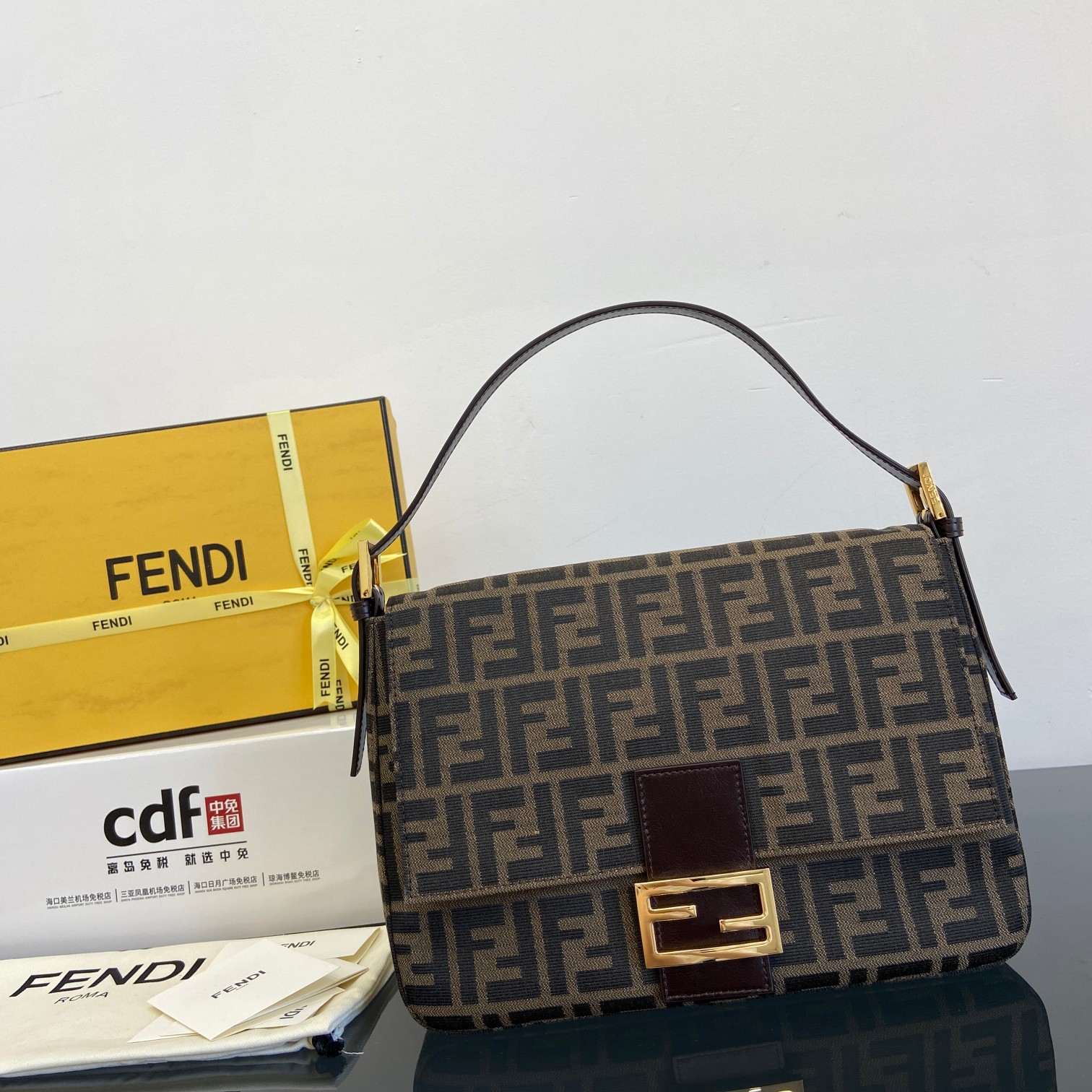 Fendi's new and upgraded model debuts at a premium level. gold buckle