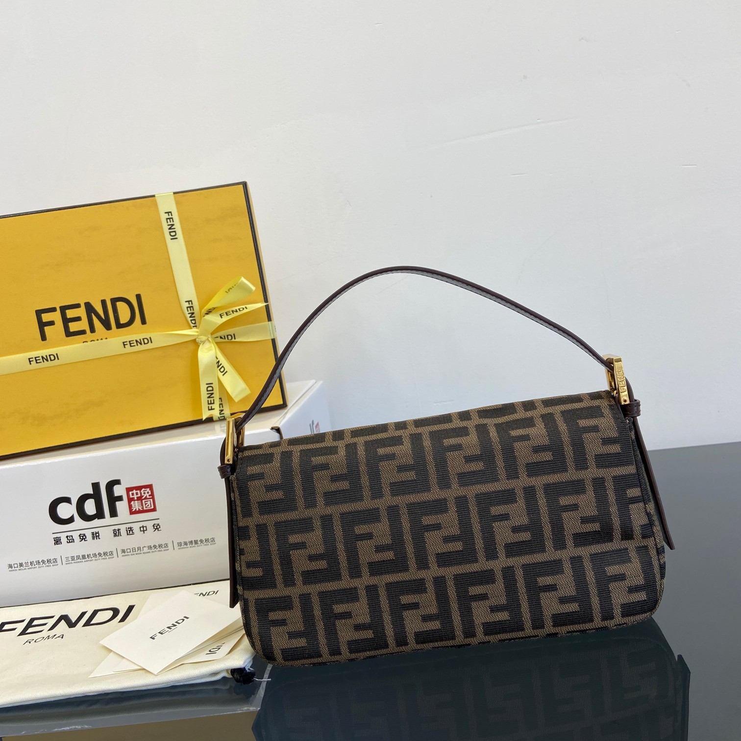 Fendi's new and upgraded model debuts at a premium level. gold buckle