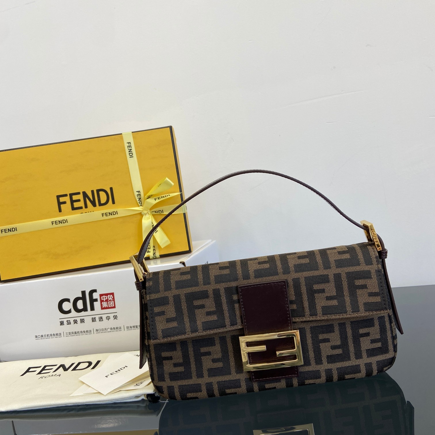 Fendi's new and upgraded model debuts at a premium level. gold buckle