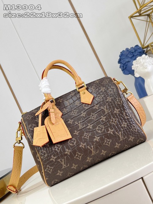 Speedy Bandoulière 30: Monogram Embossed Leather Satchel with Shoulder Strap 1 Speedy Bandoulière 30: Monogram Embossed Leather Satchel with Shoulder Strap