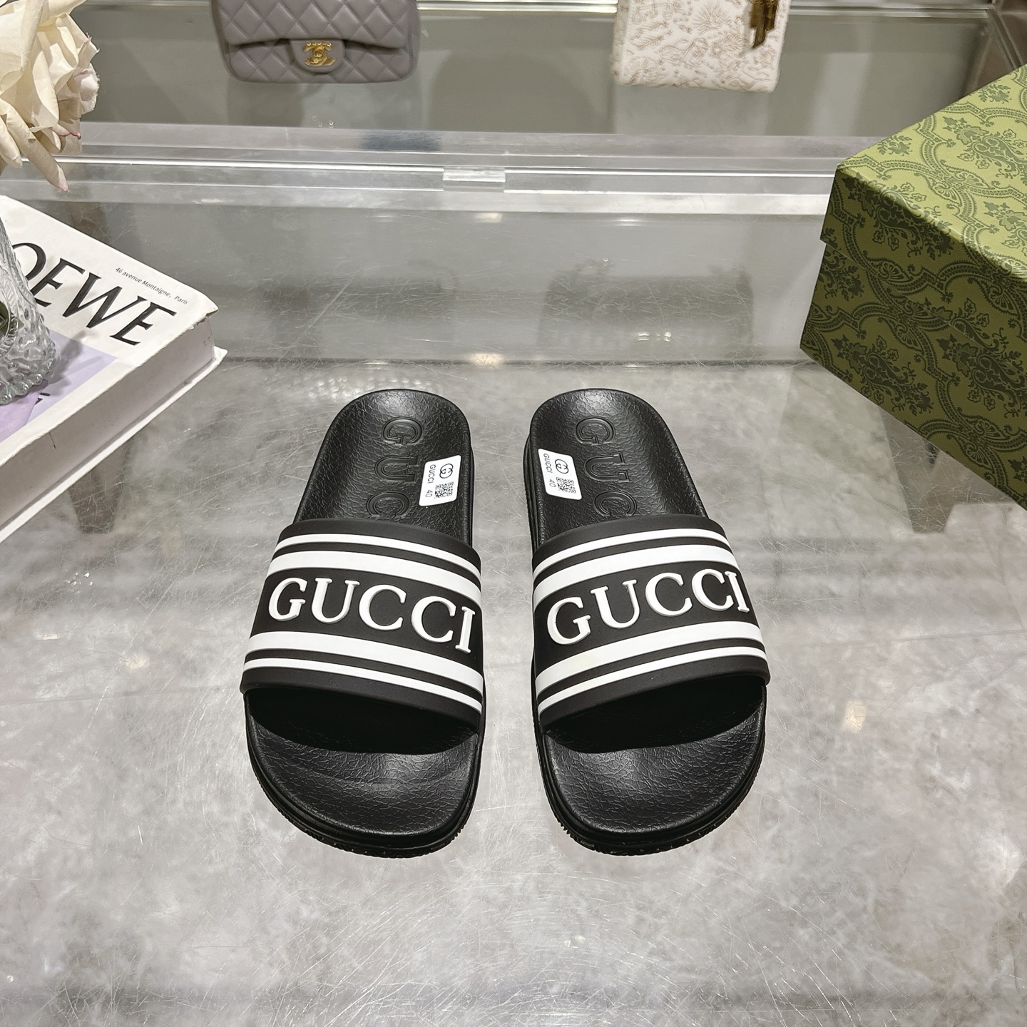 NO:226893,Gucci official website Good Game Slippers Sandals for Men In this special edition series, the acronym of the founder of the brand Guccio Gucci gives a new meaning. In the game world, 