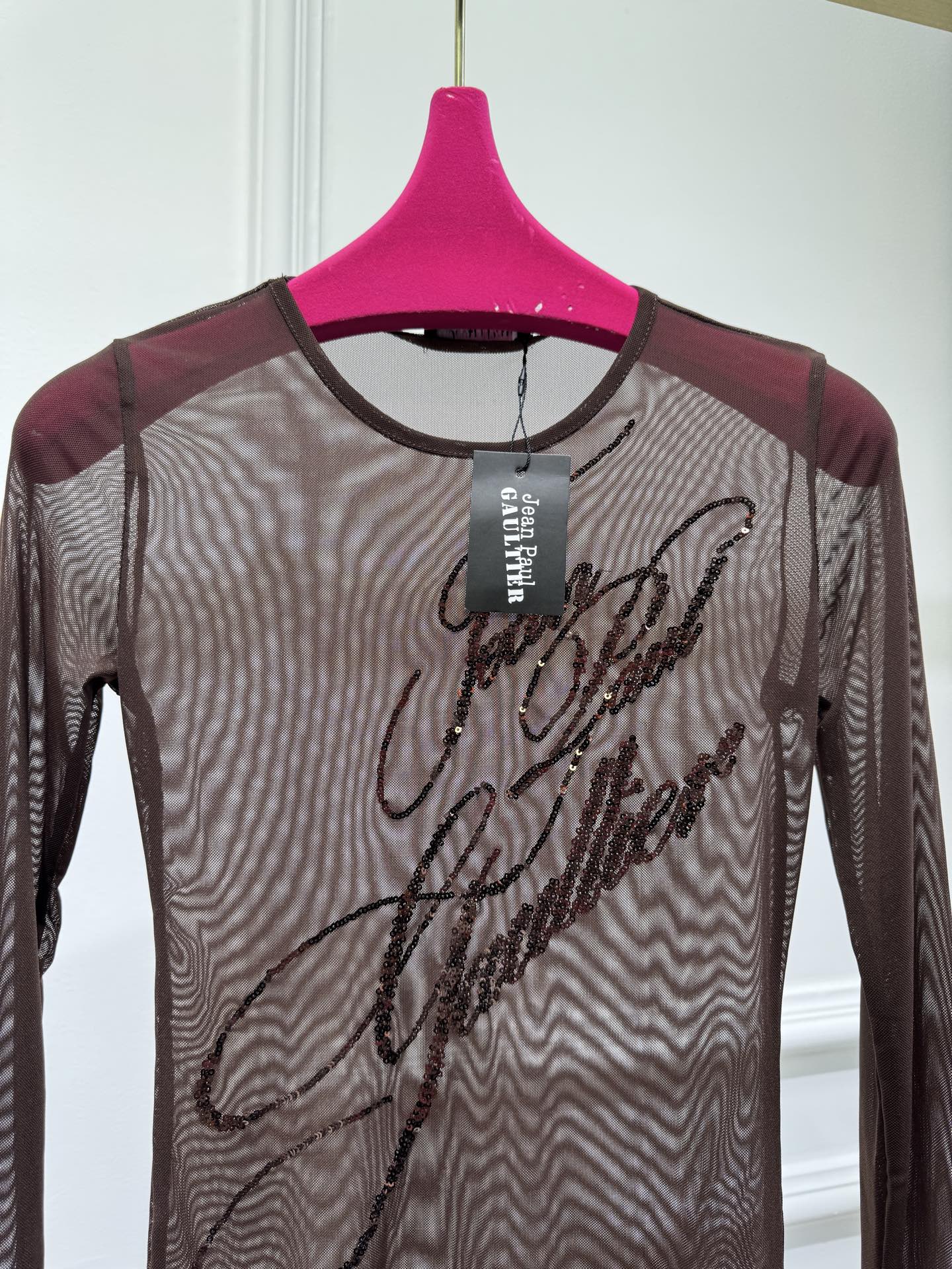 Jean Paul Gaultier 珠片透视打底衫 辣妹风～
尺码：sml，。
颜色：黑咖