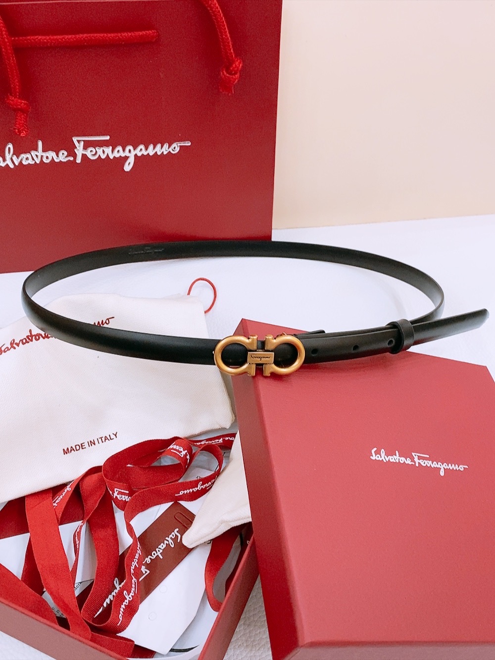 “Stylish Feragamo Classic Gancio Belt for Ms. Filagemu’s Ceremonial Attire”