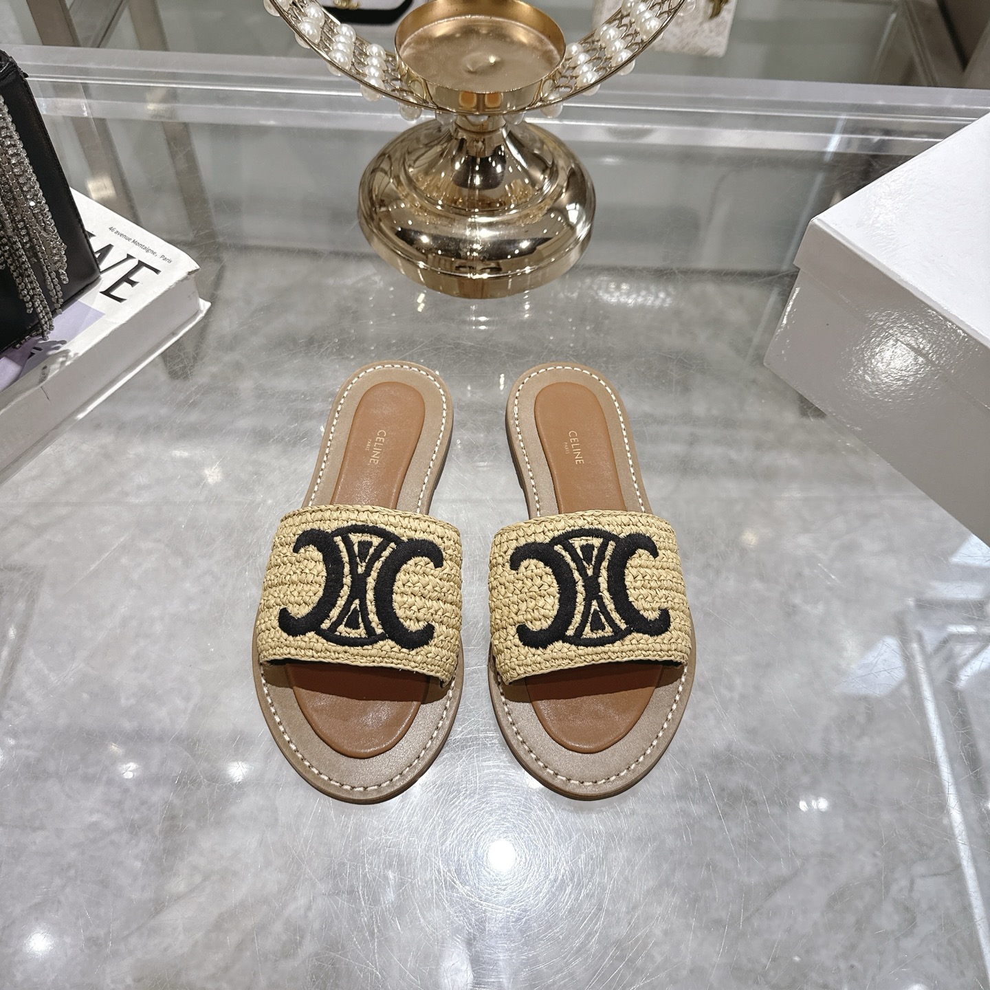Celine Women's Raffia Embroidered Logo Slip-On Sandals 1 Celine Women's Raffia Embroidered Logo Slip-On Sandals