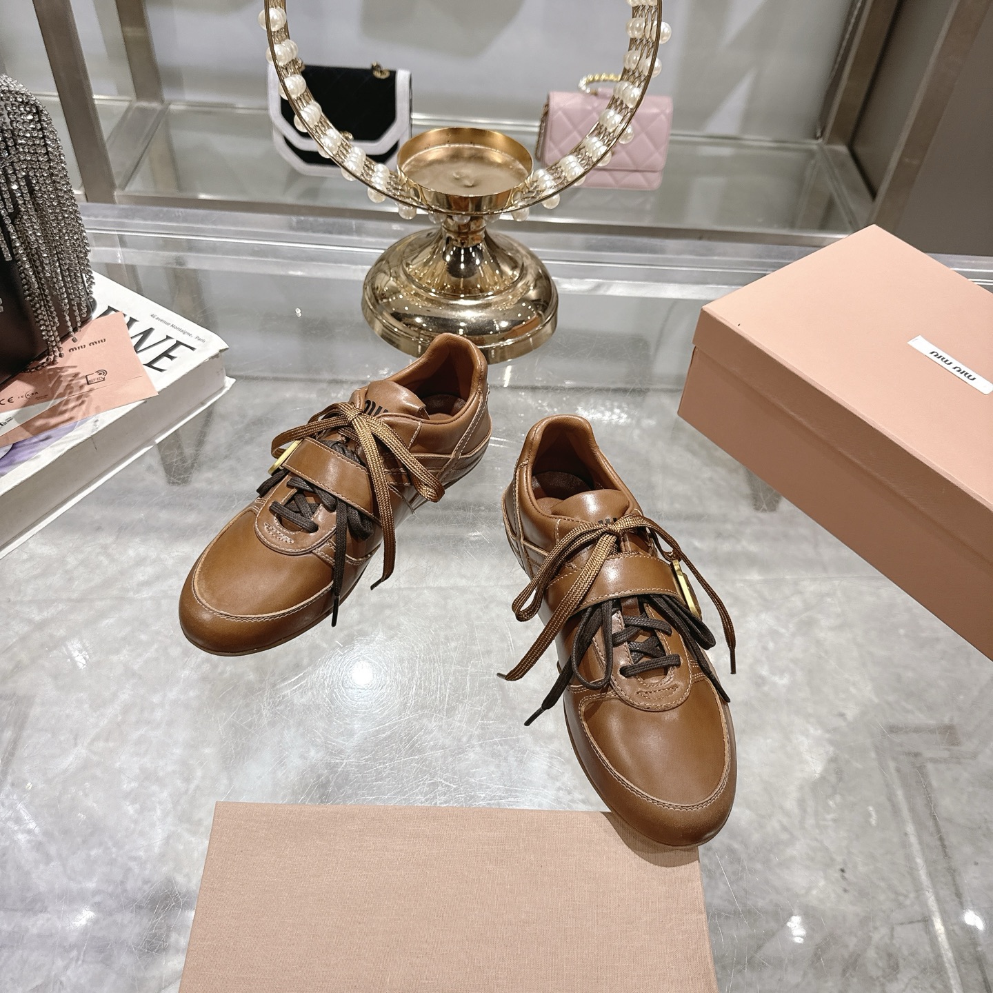 Miu Miu 25SS Leather Sneakers with Distressed Finish and Buckle Detail 4 i1744870075191 5286 0 1