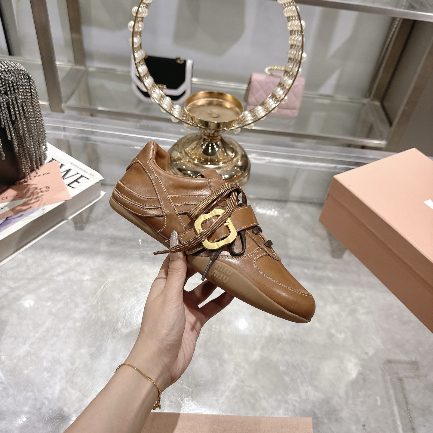 Miu Miu 25SS Leather Sneakers with Distressed Finish and Buckle Detail 2 i1744870075195 7488 0 4