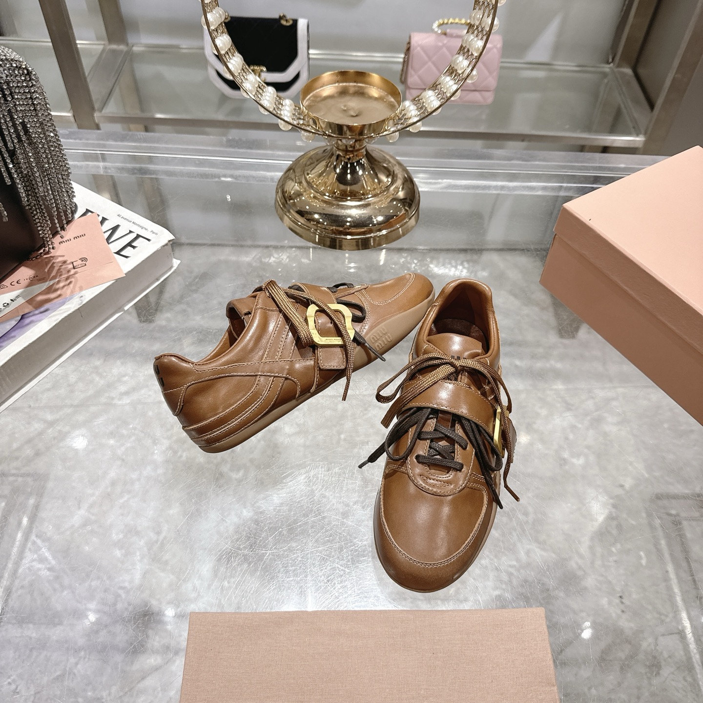 Miu Miu 25SS Leather Sneakers with Distressed Finish and Buckle Detail 7 i1744870077316 510 0 5
