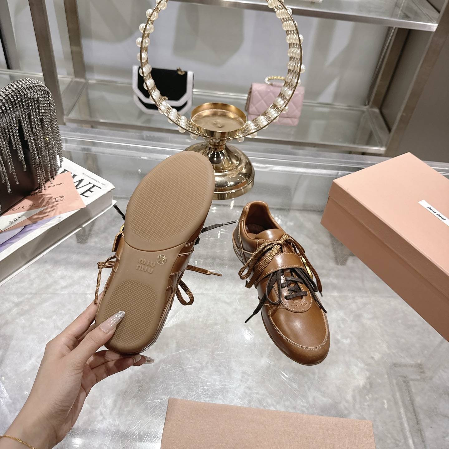 Miu Miu 25SS Leather Sneakers with Distressed Finish and Buckle Detail 10 i1744870077489 880 0 8