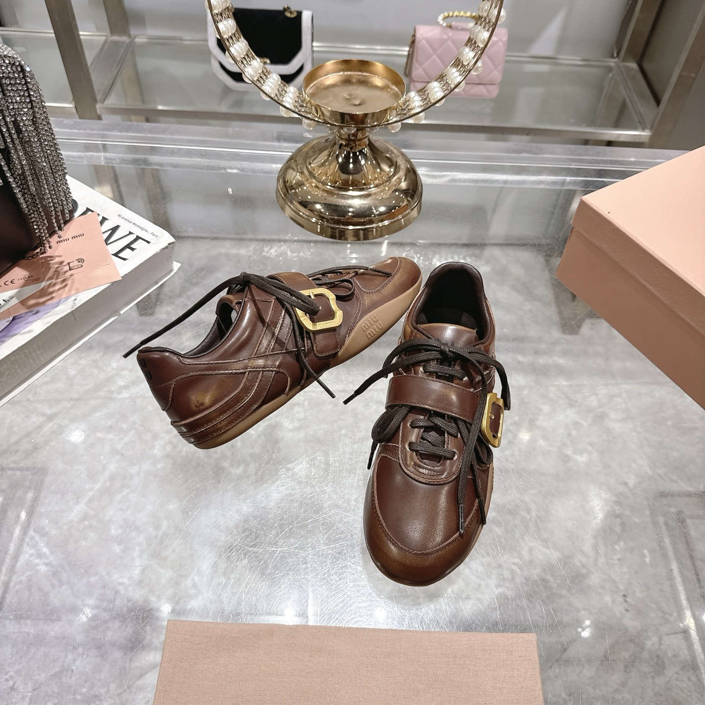 Miu Miu Women's Distressed Leather Sneakers with Buckle Detail, Brown 7 i1744870125807 2377 0 5