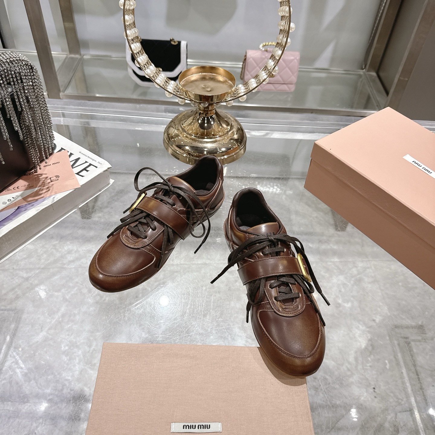 Miu Miu Women's Distressed Leather Sneakers with Buckle Detail, Brown 4 i1744870125820 8576 0 1