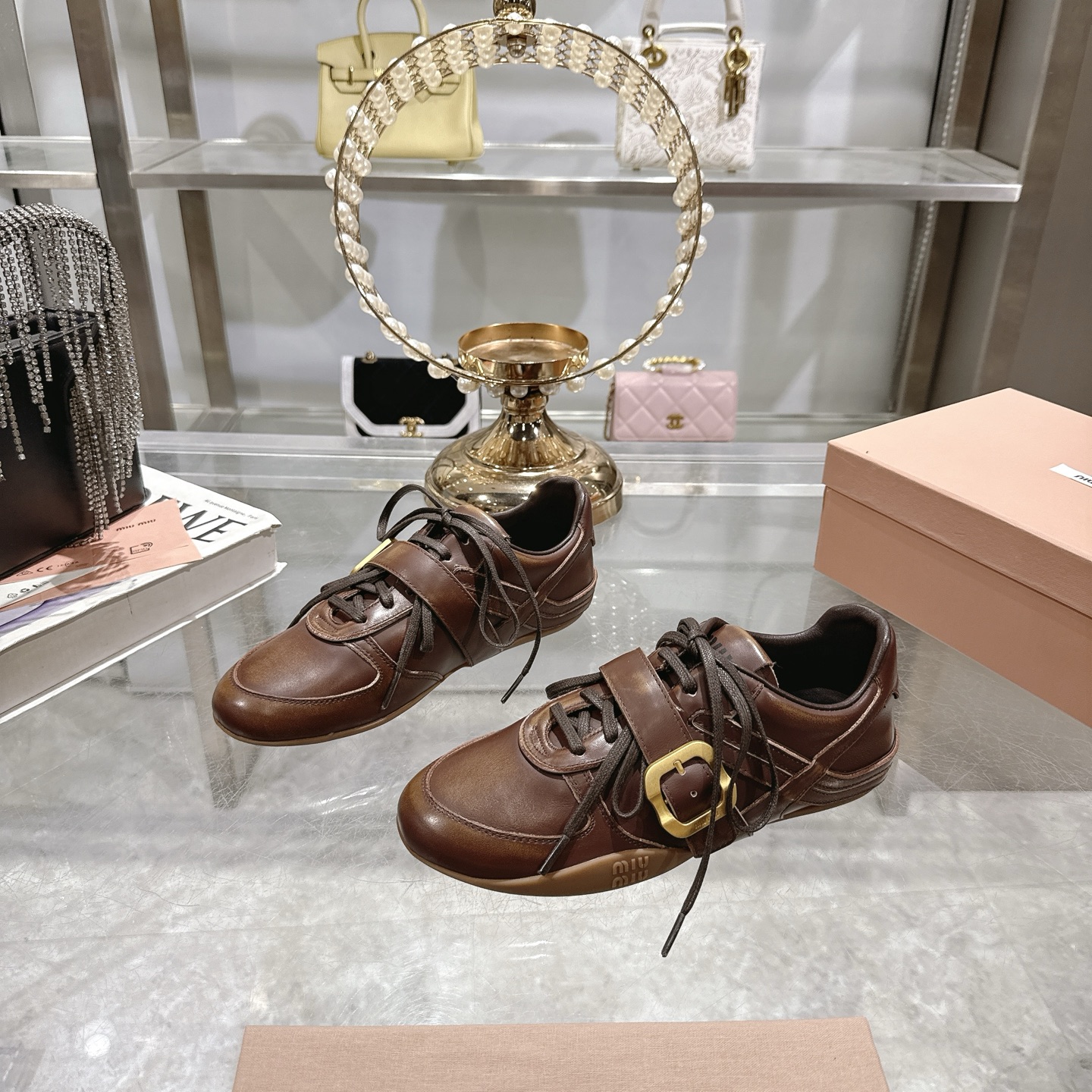 Miu Miu Women's Distressed Leather Sneakers with Buckle Detail, Brown 5 i1744870125871 6534 0 2