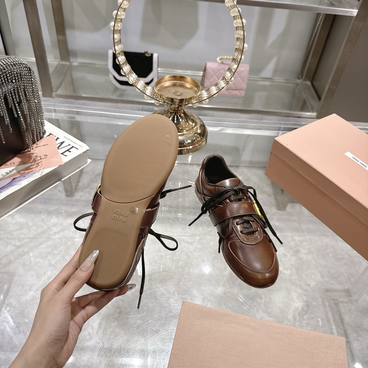 Miu Miu Women's Distressed Leather Sneakers with Buckle Detail, Brown 10 i1744870127289 7888 0 8