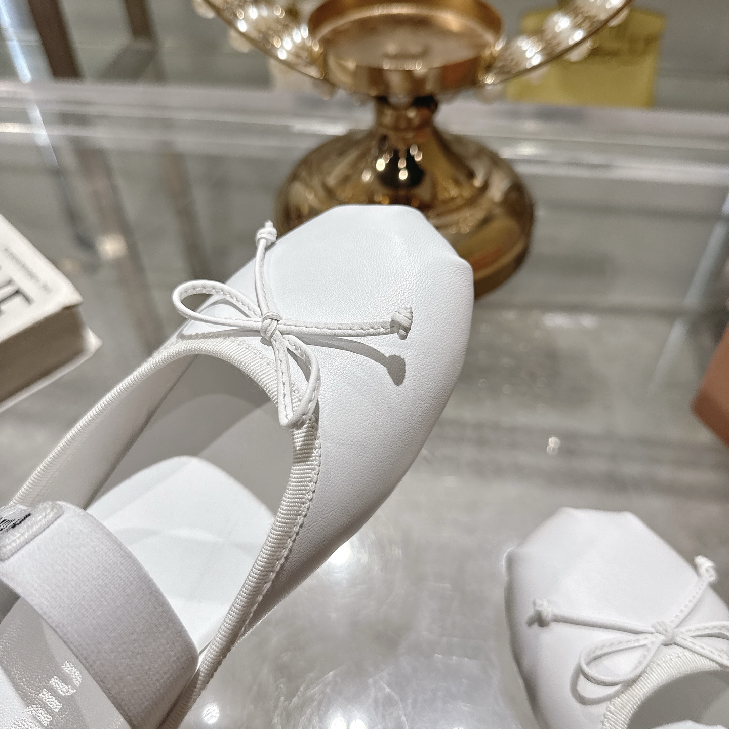 Miu Miu Bow-Embellished Leather Ballet Mules, Slip-On Shoes for Women 9 i1745735375058 18 0 7