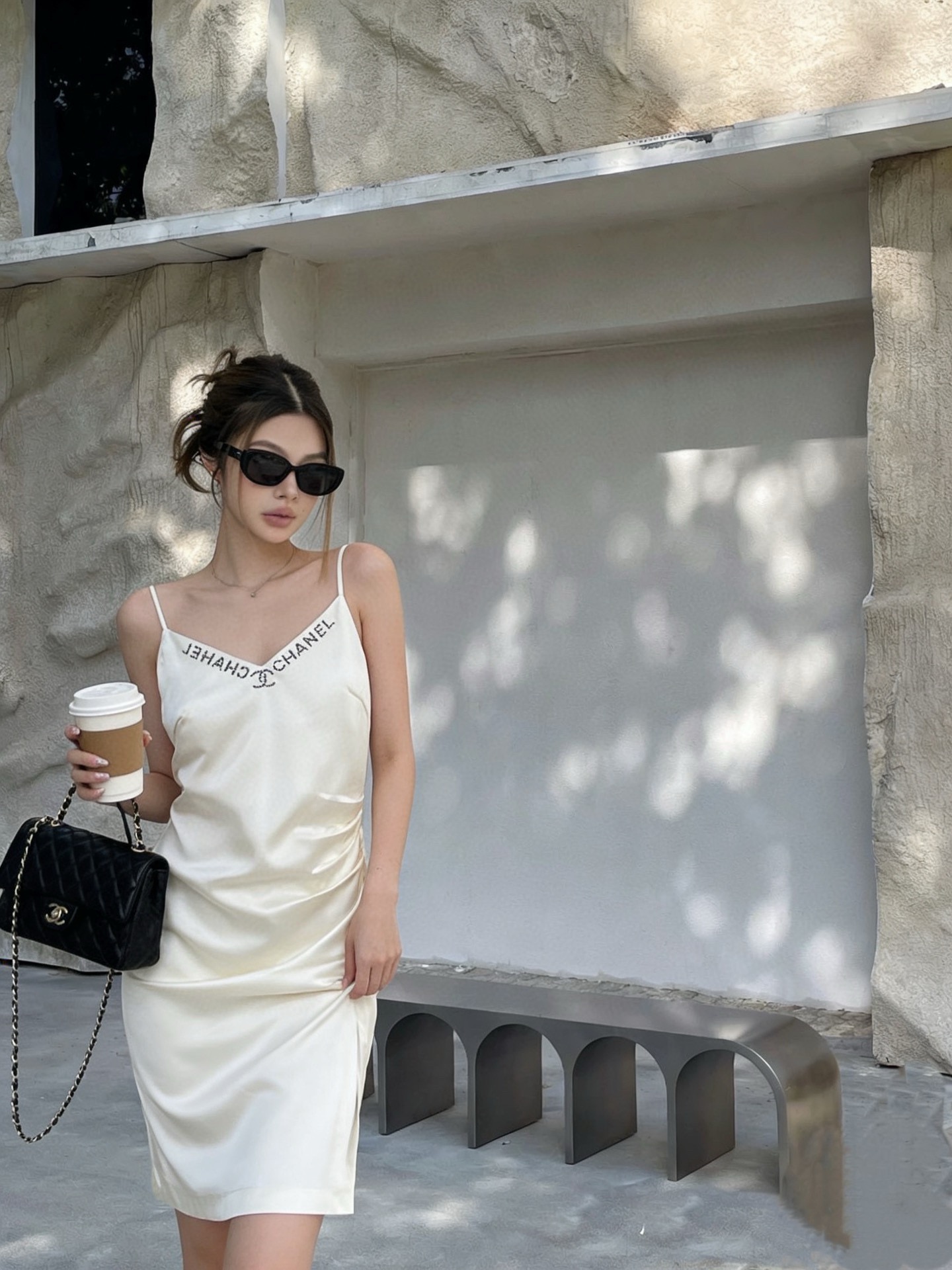 NO:753854,Chane*26Ss early spring new v-neck rhinestone suspender dress丨exclusively developed by yb!  High quality production!  Made of high-grade silk satin fabric as the base, with built-in anti-seepage lining. The side zipper makes it easy to put on the body. The sling is adjustable.  The sexy beige low-key texture has a warm vertical texture. The V-neck letter logo is embellished with hot-drilling technology, which reflects the fine luster under different lights, integrating luxury into daily life. The waist pleat design creates a perfect curve and can easily enhance the sophistication of the overall shape. It is a must-have item in the early spring wardrobe that combines style and practicality. Ready for sale S/M/L,, chanel, skirts, silk fabric,19860909Chane*26Ss早春新款 v领字烫钻吊带连衣裙丨独家yb开发！高版出品！以高级丝质绸缎面料为底,内置防透层里布 侧拉链轻松上身 吊带可调节 小性感米色系低调肌理自带温暖垂直质感.v领字母标识采用烫钻工艺点缀,在不同光线下折射出细碎光泽,让奢华感融入日常,腰部褶皱设计打造完美曲线,还都能轻松提升整体造型的精致度,是早春衣橱里兼具格调与实穿性的必备单品.现货发售S/M/L,,chanel,skirts,silk fabric,,Women's clothing