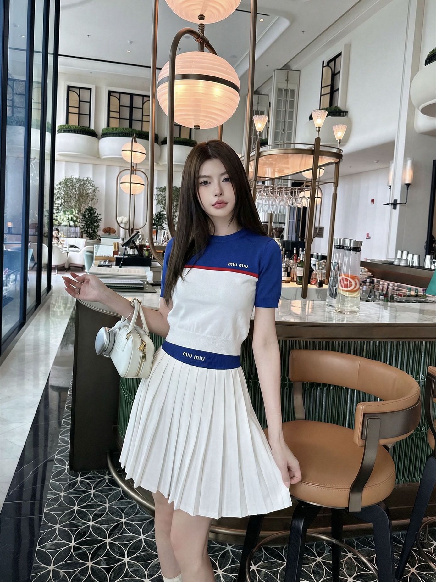 NO:803661,Miumi* 26Ss new spring and summer style contrasting knitted short-sleeved + pleated skirt suit丨exclusively developed by yb!  Top quality production!  Classic contrast knitted short round neck and short sleeves, + high-waist pleated skirt with contrasting letters, which has a low-key yet noble temperament. The upper and lower color-blocked letter jacquards not only add a sweet and cool design layer, but also highlight the brand atmosphere. The pleated skirt uses neat pleats to outline girlish lines. The short version raises the waistline, forming a perfect golden ratio with the short top, easily creating a playful and slim figure. Two colors  Available in stock S/M/L,,miumiu,skirts,T-shirt,gold,19860909Miumi* 26Ss春夏新款 撞色针织短袖+百褶半裙套装丨独家yb开发！顶级高版出品！经典撞色针织短款圆领短袖,+高腰撞色字母百褶半裙 自带低调又不失高贵的气质 上下拼色字母提花 既增添了甜酷的设计层次 又突显品牌气息 百褶半裙则以利落的褶裥勾勒出少女感线条,短款版型拉高腰线,与短款上衣形成完美的黄金比例,轻松打造俏皮又显瘦的身形.两色 现货发售S/M/L,,miumiu,skirts,T-shirt,gold,,Women's clothing
