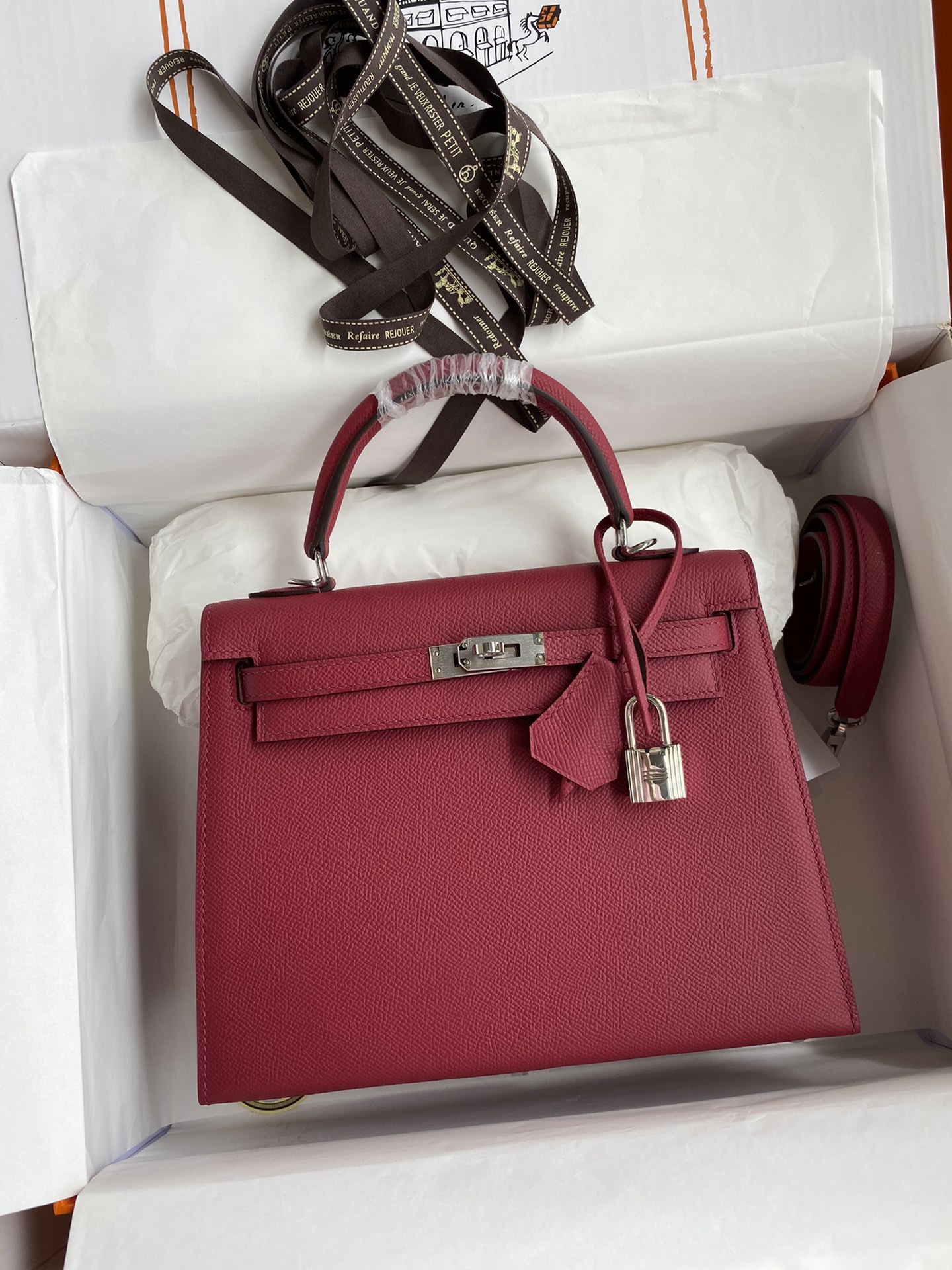 Kelly 25cm piel Epsom importada rojo rubí herrajes plateados