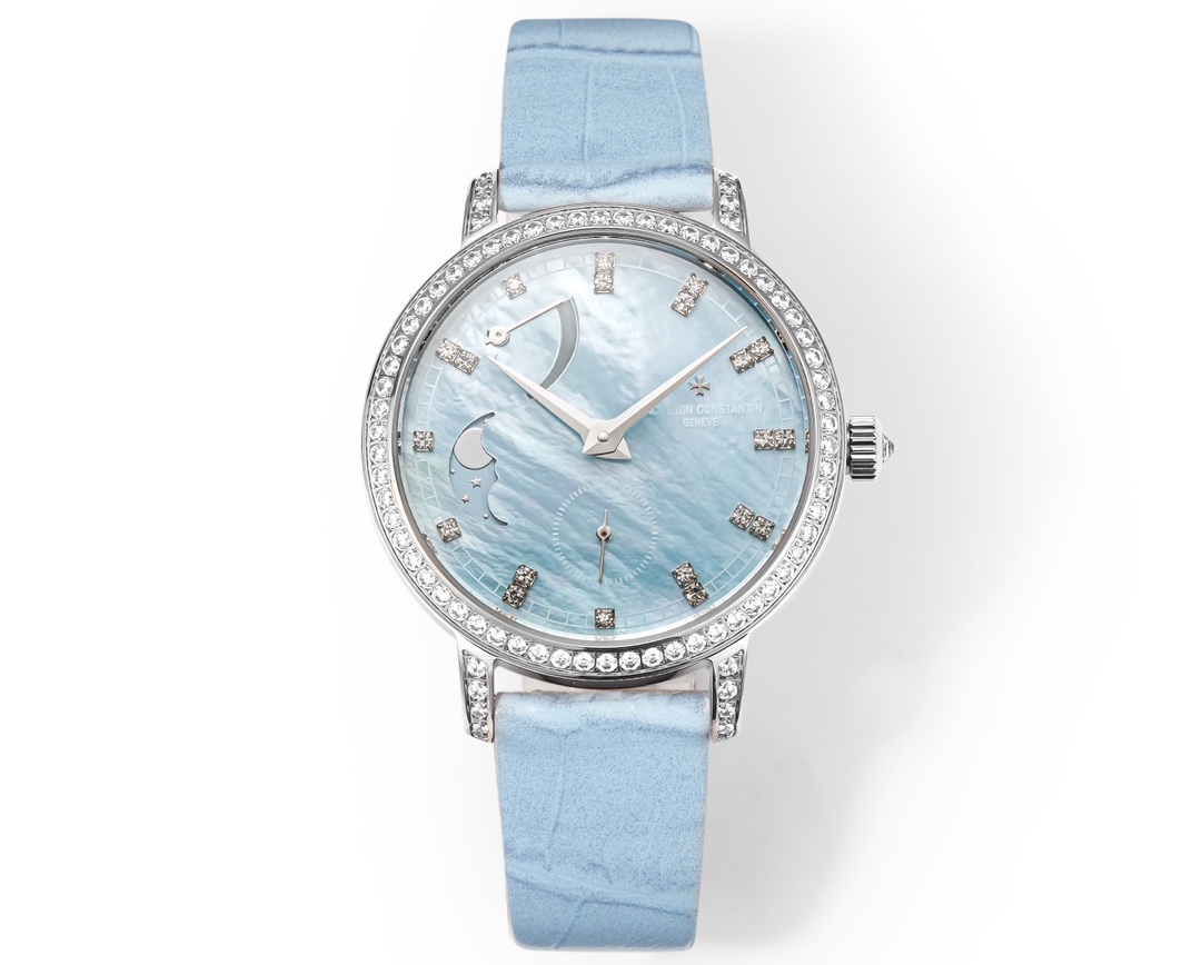 NO:715049,The Vacheron Constantin Heritage Moon Phase Watch is equipped with a round white gold case with a diameter of 36 mm. The bezel, lugs and crown are set with 81 diamonds totaling approximately 1.2 carats. The white mother-of-pearl dial is equipped with the most poetic moon phase profit and loss display function among all the complex functions of high-end watches. The watch is equipped with a movement independently developed and manufactured by Vacheron Constantin. The power reserve is approximately 72 hours, which can provide sufficient power for the hours, minutes, small seconds and moon phase profit and loss display functions.  The watch is also equipped with a low-key and elegant Italian calf leather belt. The elegant and feminine design is a good choice for daily matching.,,vacheron,cowhide19860909江诗丹顿传袭系列月相腕表搭配直径36毫米 圆形白金表壳,表圈、表耳和表冠镶嵌了总重约1.2克拉的81颗美钻  白色珍珠贝母表盘之上配备了高级腕表所有复杂功能当中最富诗意的月相盈亏显示功能.  腕表搭载由江诗丹顿自主研发并制造的机芯,动力储存约72小时,可为小时、分钟、小秒针及月相盈亏显示功能提供充足动力.   腕表还搭配了低调优雅的意大利小牛皮带优雅柔媚的设计是日常搭配的上佳之选.,,vacheron,cowhide,Watch