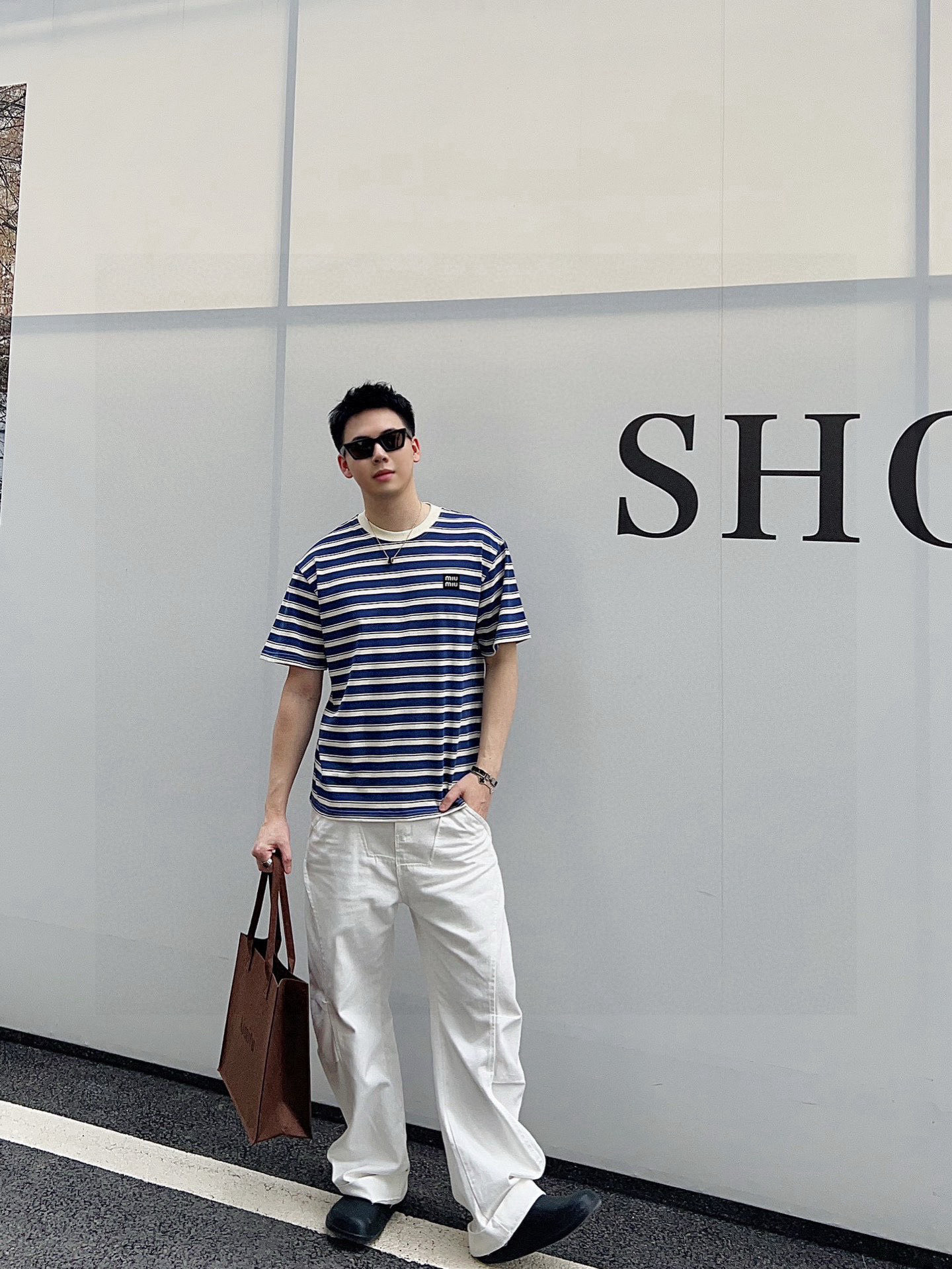 ￼ ￼ ￼ ￼    Miu Miu 25官网同步发售 欧美流行趋势 洗水分层工艺 洗水纯棉面料 条纹线