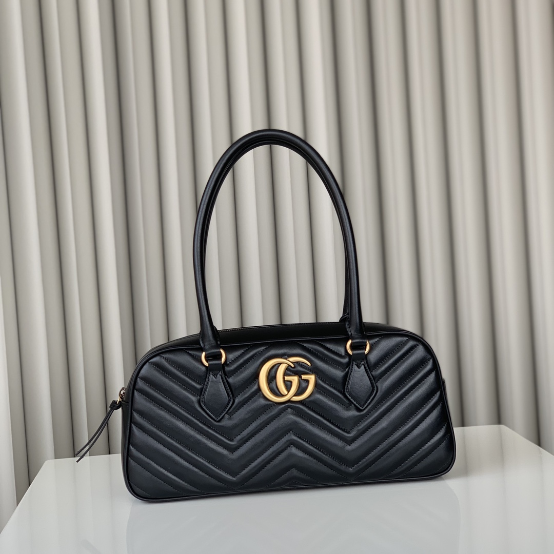 Gucci Marmont series medium handle bag, black seamed V-shaped original leather, with gold-tone accessories, zipper closure, model number 795218 c