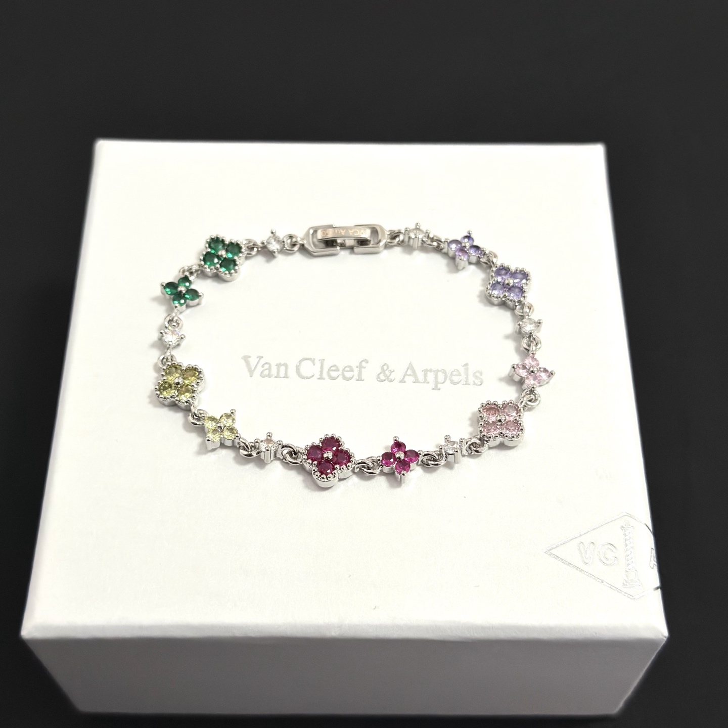 Van Cleef Arpels Alhambra bracelet Silver-toned metal with multicolor gemstones green yellow red pink purple and clear diamond accents 17cm