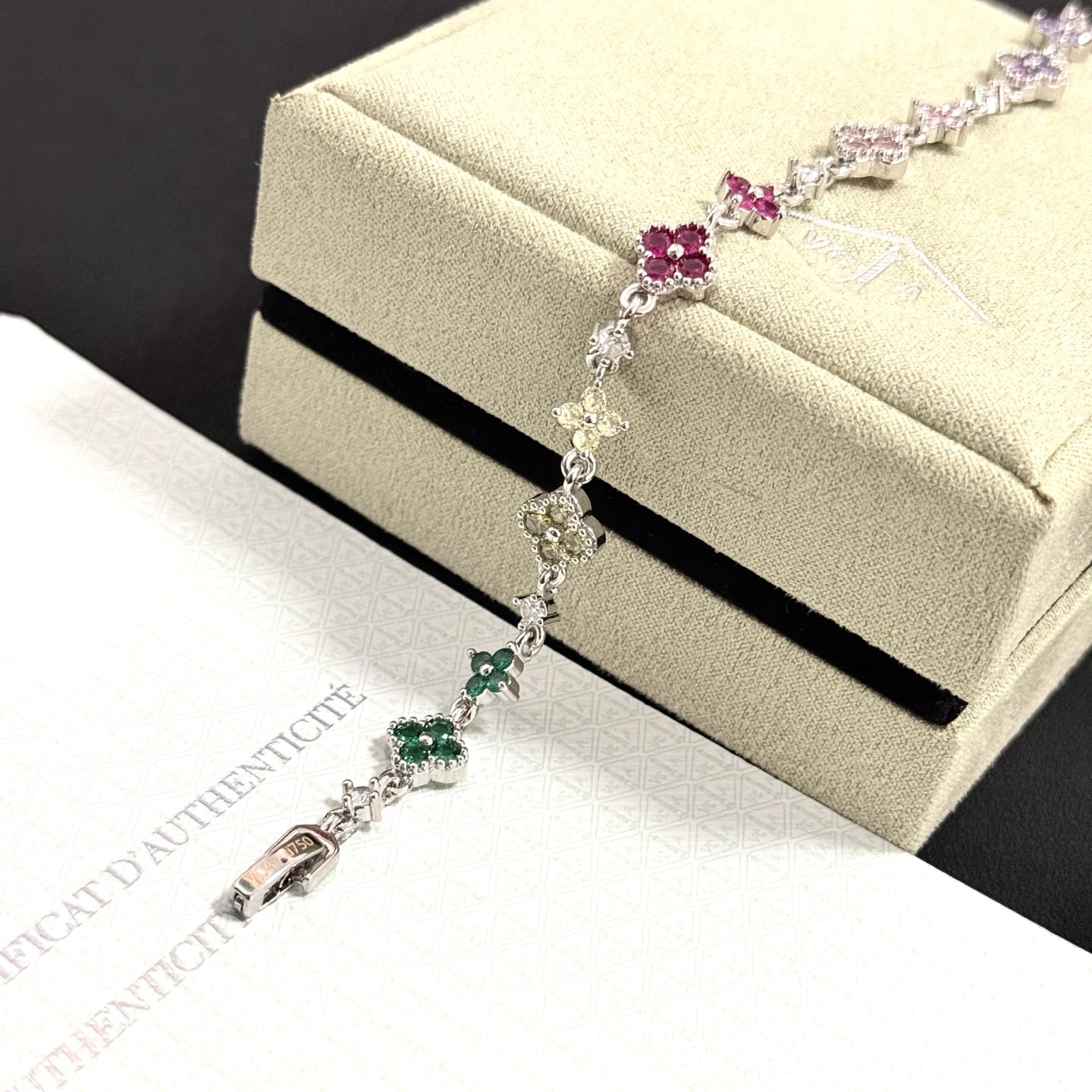 Van Cleef Arpels Alhambra bracelet Silver-toned metal with multicolor gemstones green yellow red pink purple and clear diamond accents 17cm
