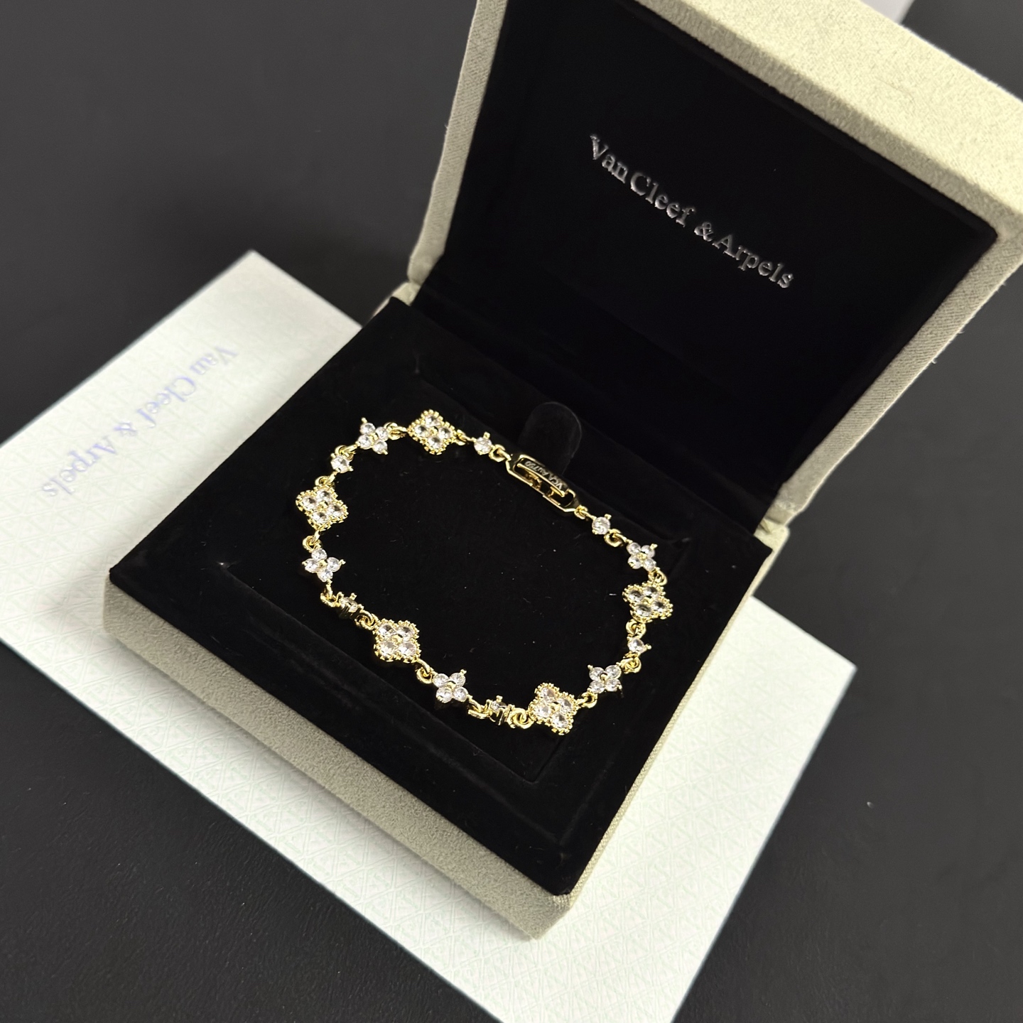 Van Cleef Arpels Alhambra bracelet gold-tone metal with clear diamond-like stones 17cm