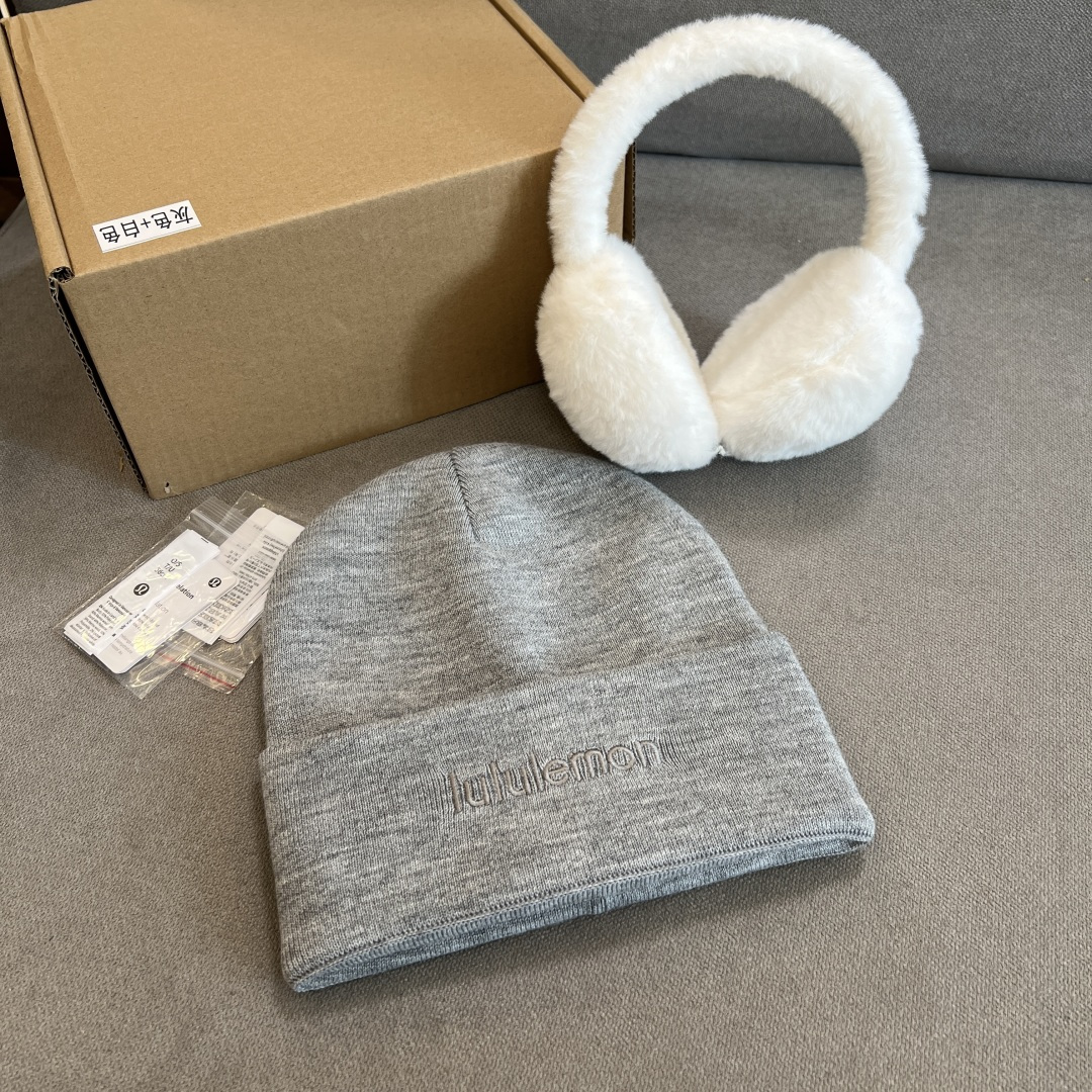The versatile grey plush ear cap is very warm and textured!And the desig - Hat