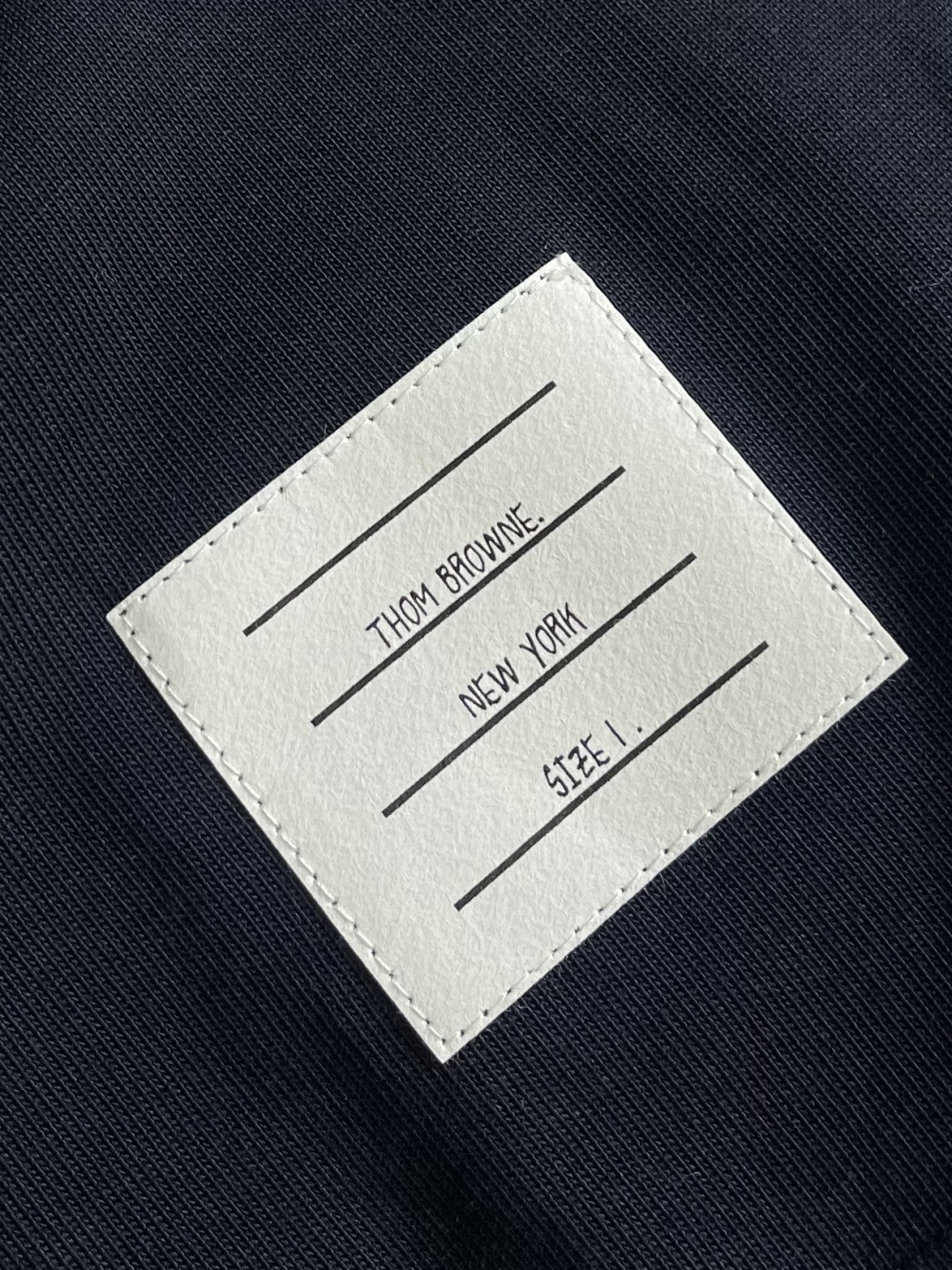 TB ThomBrowne汤姆布朗 撞色领净色简约长袖Polo 极简风格 简约设计经典标志 高克重烧毛工