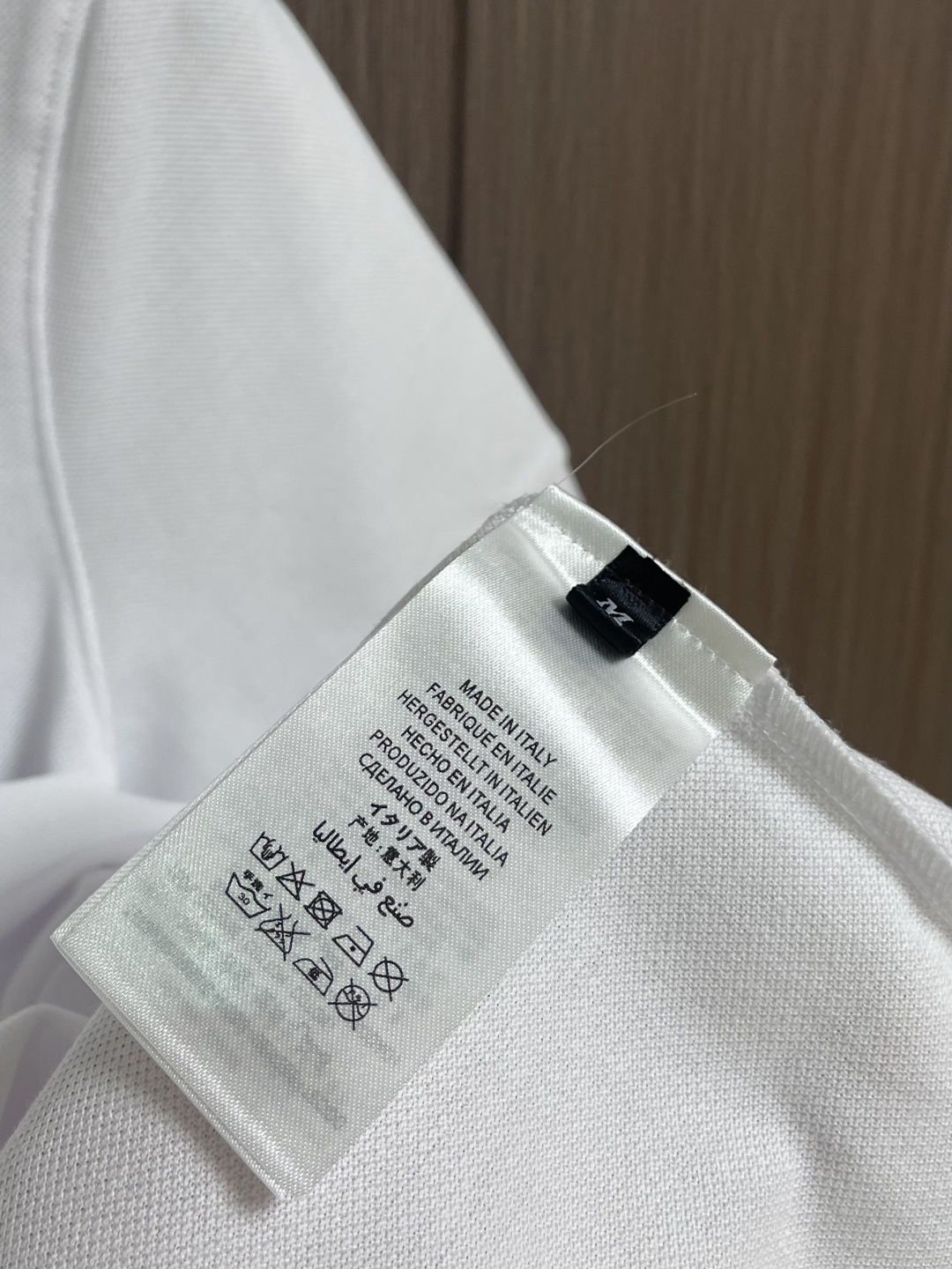 Prada 半拉链短袖Polo衫，客供面料舒适透气 挺括有型标志性Prada三角标识点缀正面 立体廓形优