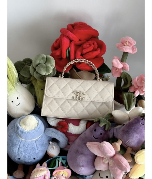 Chanel 2.55 Beige Crossbody Bag with Chain and Quilted Detailing 1 Chanel 2.55 Beige Crossbody Bag with Chain and Quilted Detailing