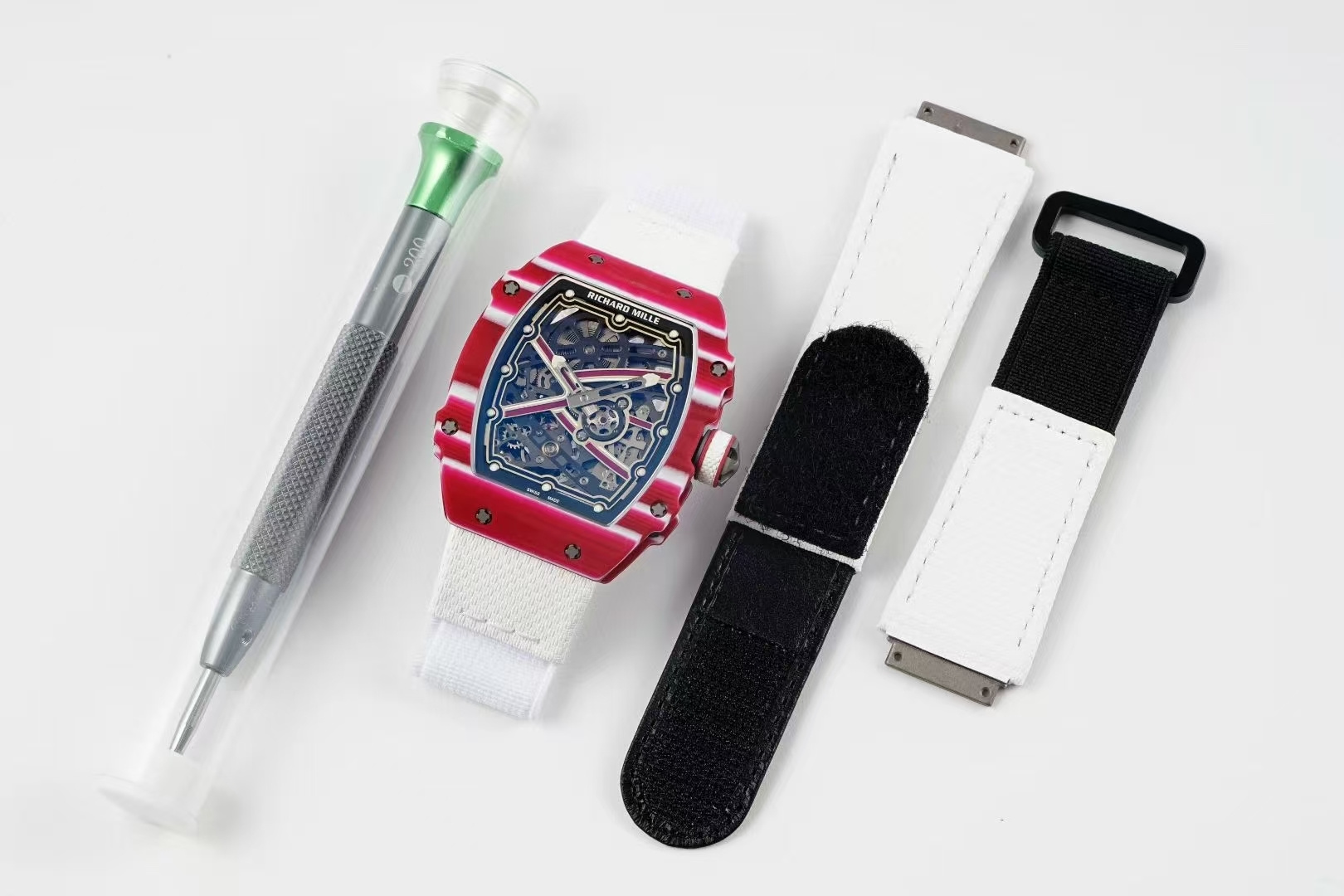 NO:714971,Produced by AV, the Richard RM 67-02 has a thickness of only 7.8 mm and a weight of only 35 grams. It feels more like a 'second skin' on the hand. It is as light as nothing, but it hides top-notch movements and composite materials. The case process is made of hundreds of layers of carbon fiber and quartz fiber, each layer is only 45 microns, and is cured and formed under high temperature and pressure of °C and 6 bar.  The visual effect is whether the driver is on the track or in a business venue, this texture is low-key showing off 'I come from top craftsmanship.' The movement is AV custom-grade CRMA7 automatic winding, with a bare metal size of about 28.40×31.25 mm and a thickness of about 3.60 mm. This is the combination of 'top engineering + competitive spirit'. Wearing it, you will experience a combat-grade luxury watch.19860909AV出品,理查德 RM 67-02,厚度只有 7.8 mm,重量仅 35 克,上手更像“第二层皮肤”.轻若无物,却藏着顶级机芯与复合材质. 表壳工艺由数百层碳纤维与石英纤维交错叠加,每层仅 45 微米,在 °C、6 bar 高温高压下固化成型. 视觉效果无论是车手上赛道还是商业会场,这一块纹理都在低调炫技‘我来自顶级工艺.” 机芯AV定制级CRMA7 自动上链,裸机尺寸约 28.40×31.25 mm,厚度机器件约 3.60 mm. 这是“顶尖工程 + 竞技精神”的结合.戴上它,更是体验战斗级的豪表.,,Watch