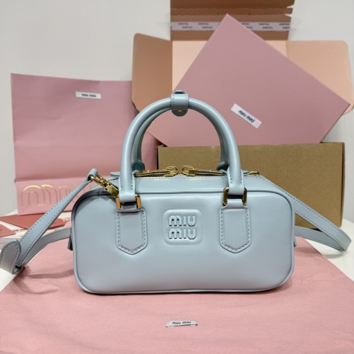 Miu Miu Bowling Bag in Lake Blue Leather with Matelasse Pattern 1 Miu Miu Bowling Bag in Lake Blue Leather with Matelasse Pattern