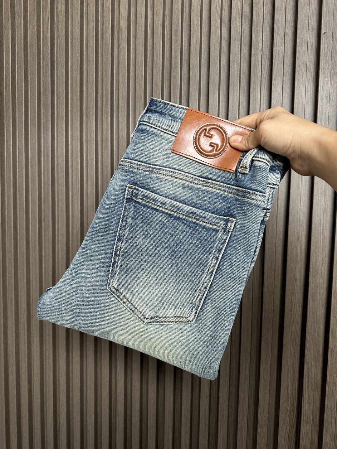 Gucci Men's Slim-Fit Light Wash Jeans with Leather Logo Patch