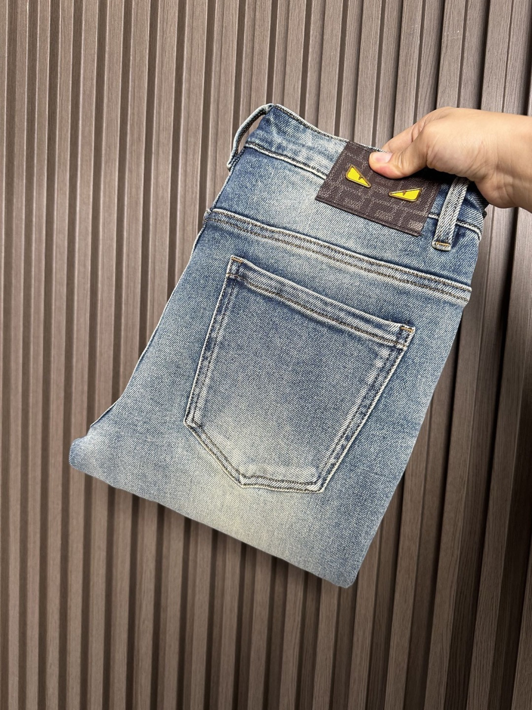 Fendi Men's Light Blue Wash Denim Jeans with Signature Logo Patch