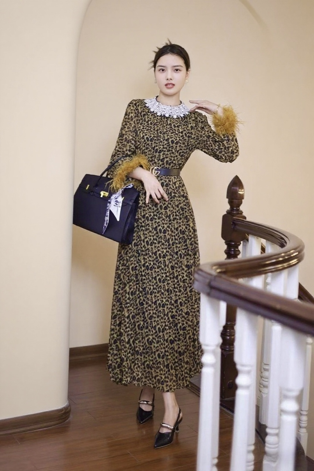 Elegant Leopard Print Maxi Dress with Pearl Collar and Feather Cuffs