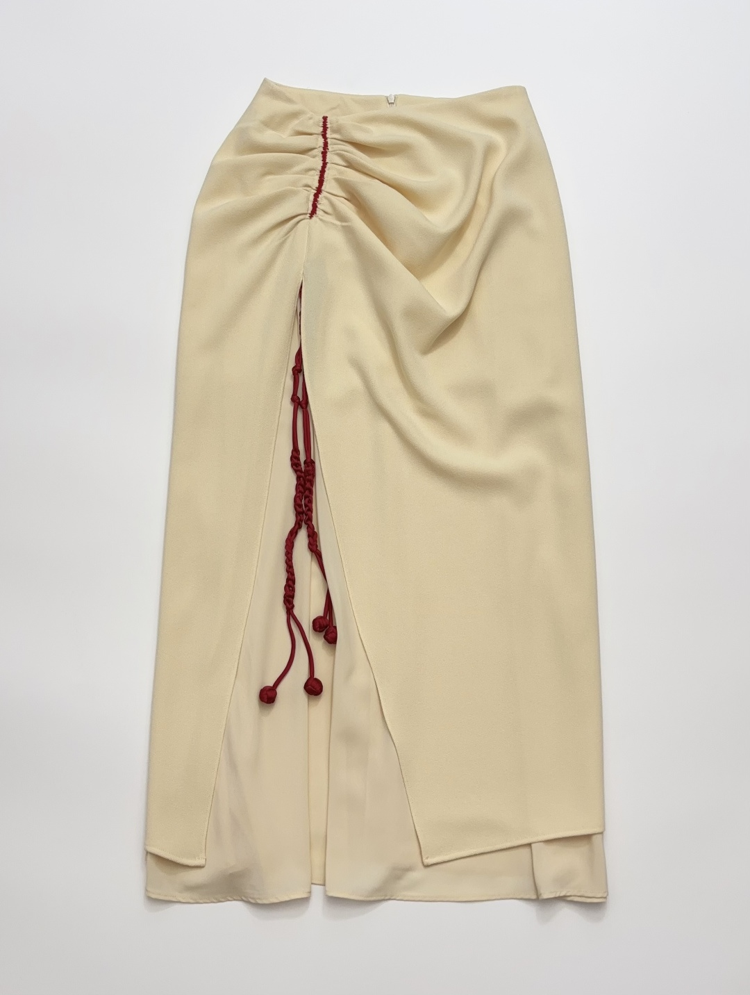 Braided Belt Tassel Ball Asymmetric Pleated Midi Skirt