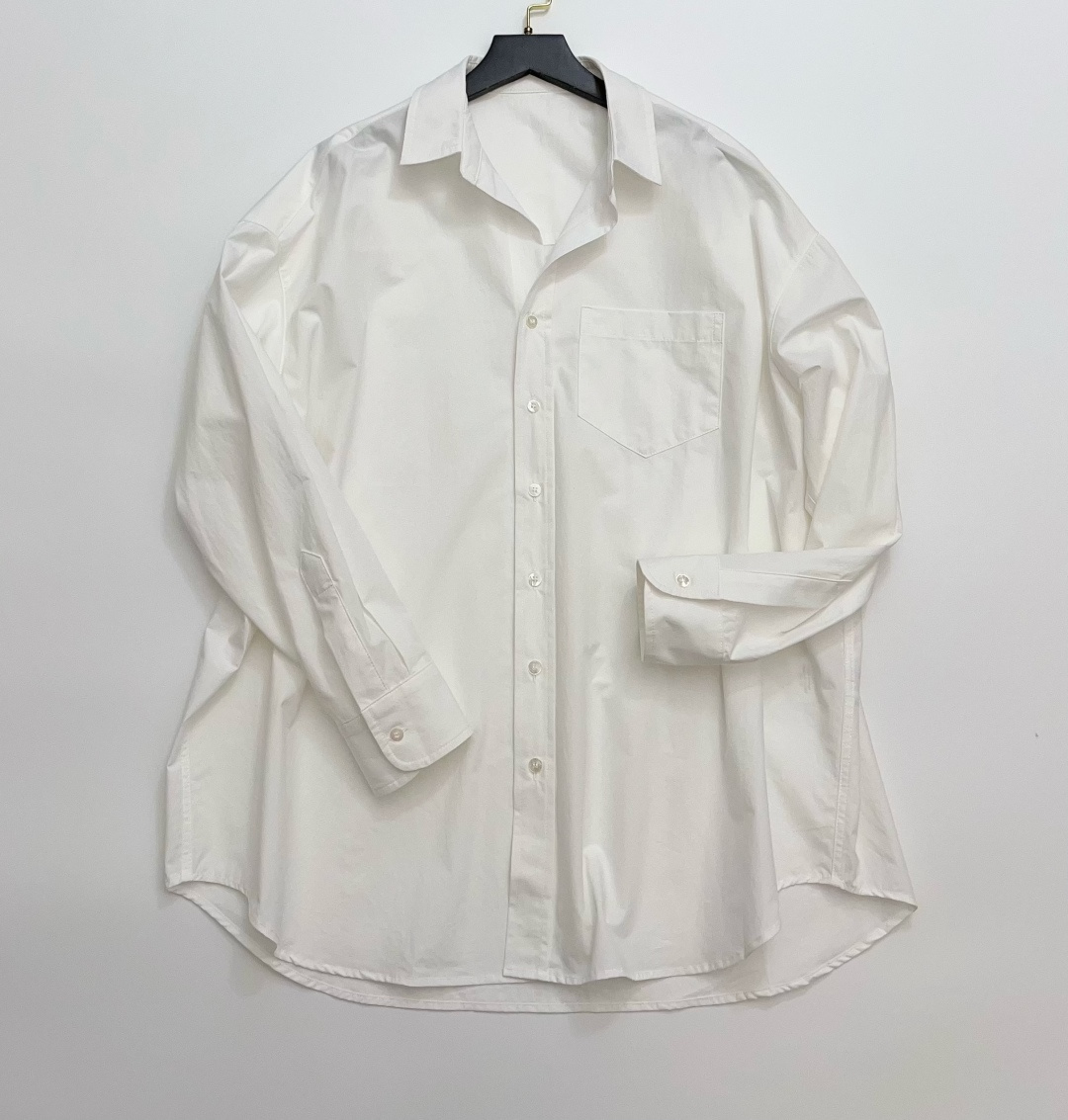 The Row Relaxed Fit Solid Color Lapel Shirt Top