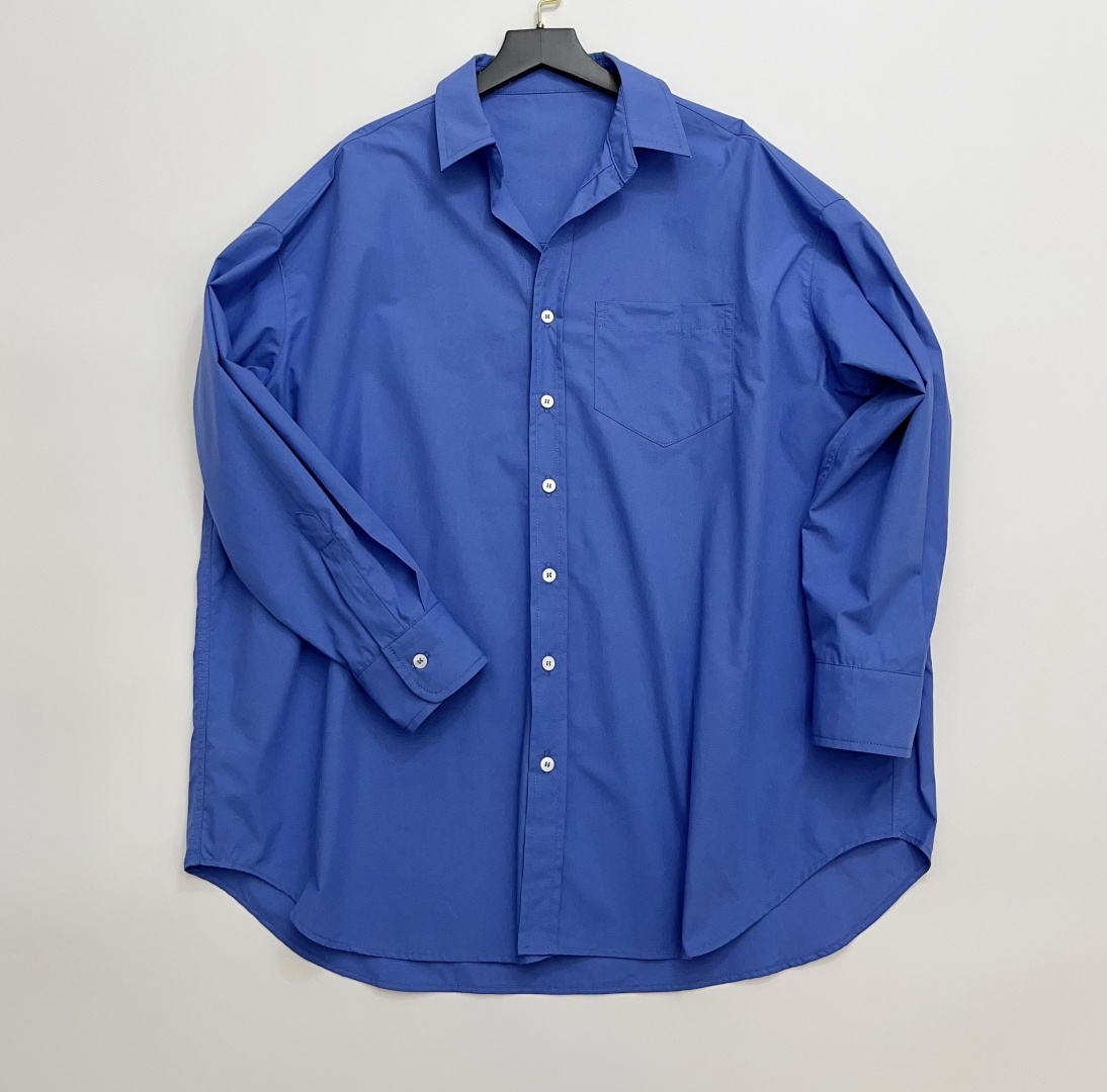 The Row Relaxed Fit Solid Color Lapel Shirt Top
