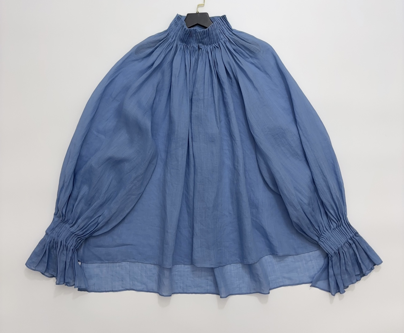 Into The East Blue Semi-Sheer Accordion Pleat Turtleneck Top