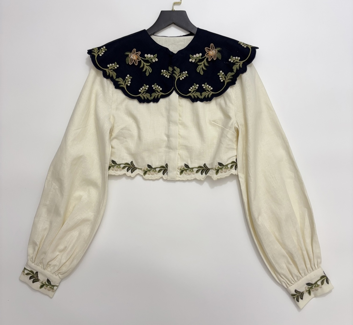 Agua by Agua Bendita SS26 Embroidered Oversized Lapel Lantern Sleeve Crop Top